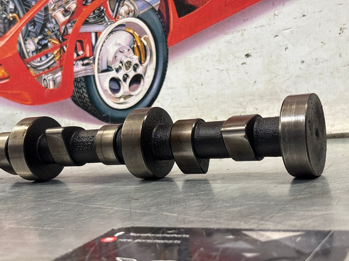 Porsche 928 cam shaft, used 9281051553R