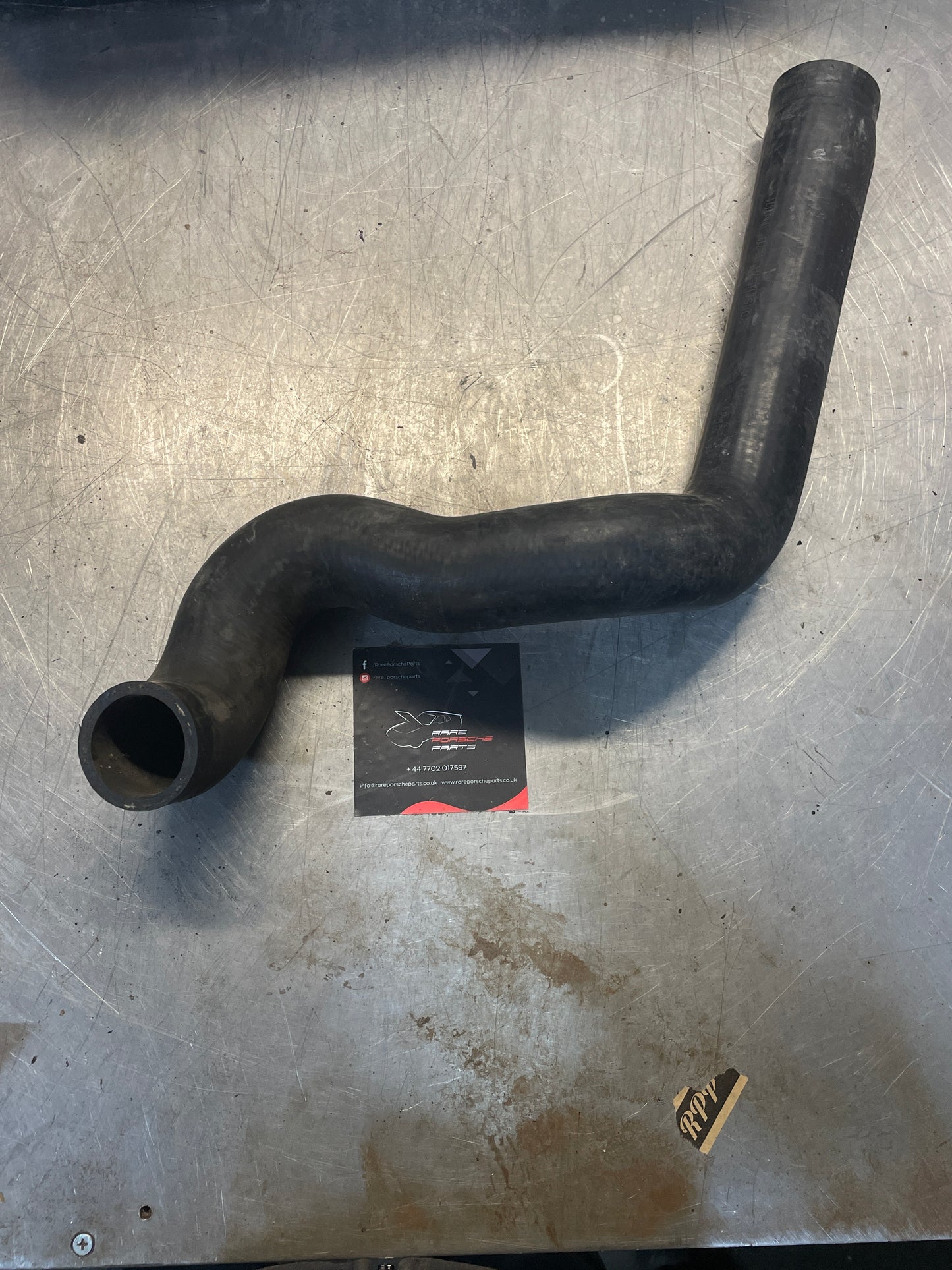 Porsche 928 radiator water hose, used 928106239