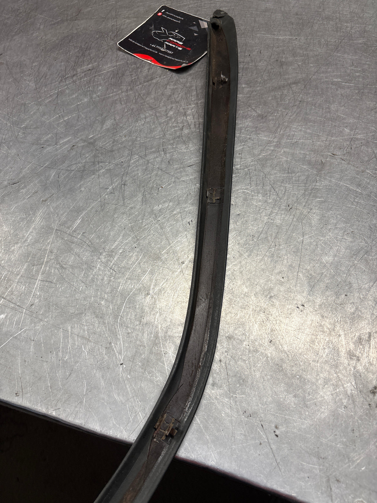 Porsche 928 left, off side door upper frame surround trim, green 92855502502, used
