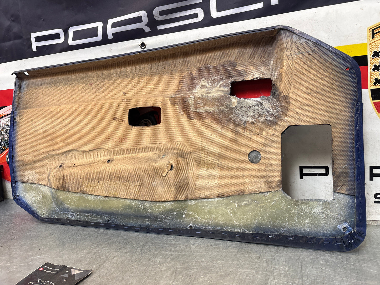Porsche 944 blue door card, right  94455501801 refurbished, repainted.