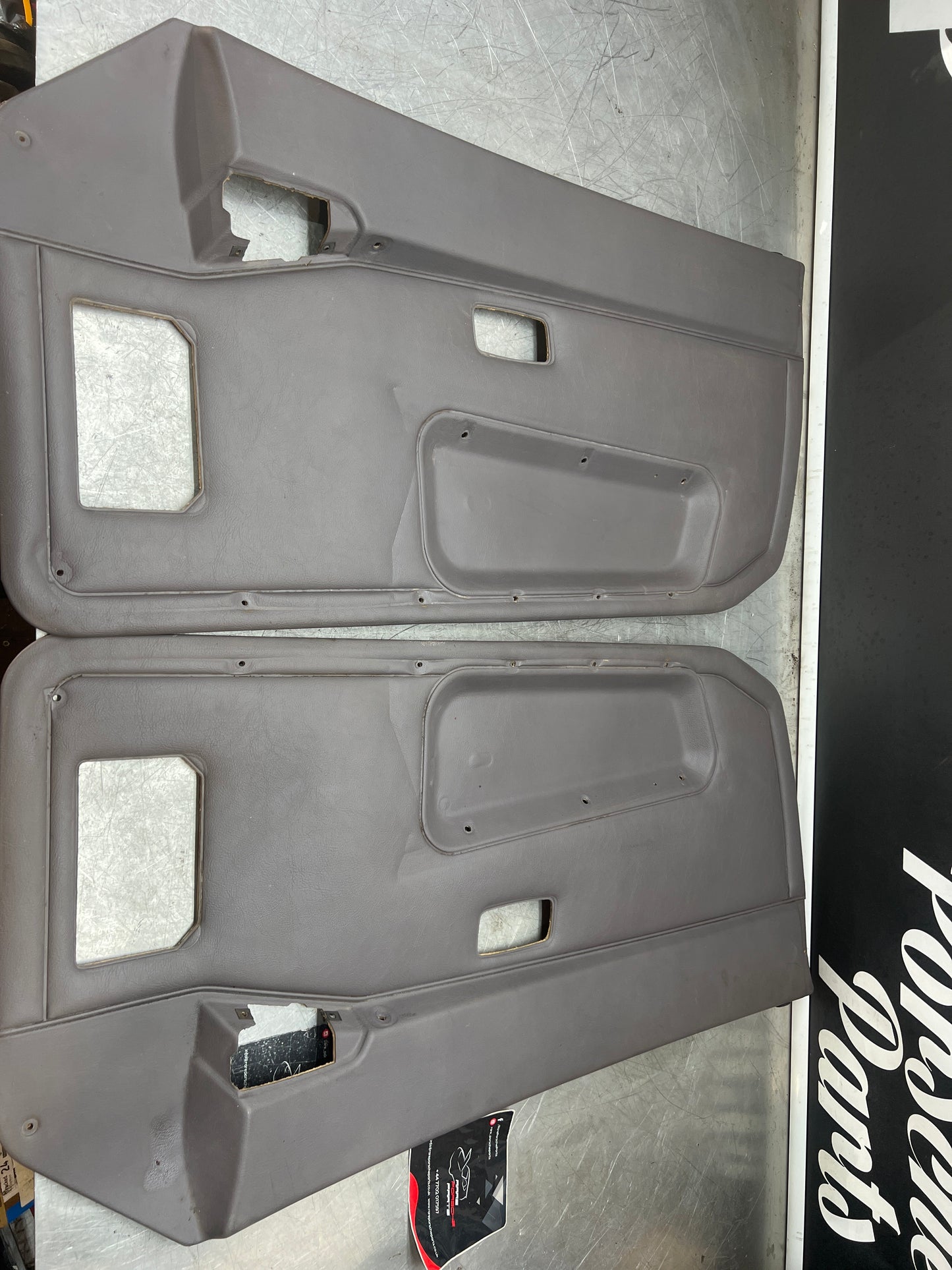 Porsche 944 85.5- pair of late UsedPorsche grey door cards, 94455501701 / 94455501801 used