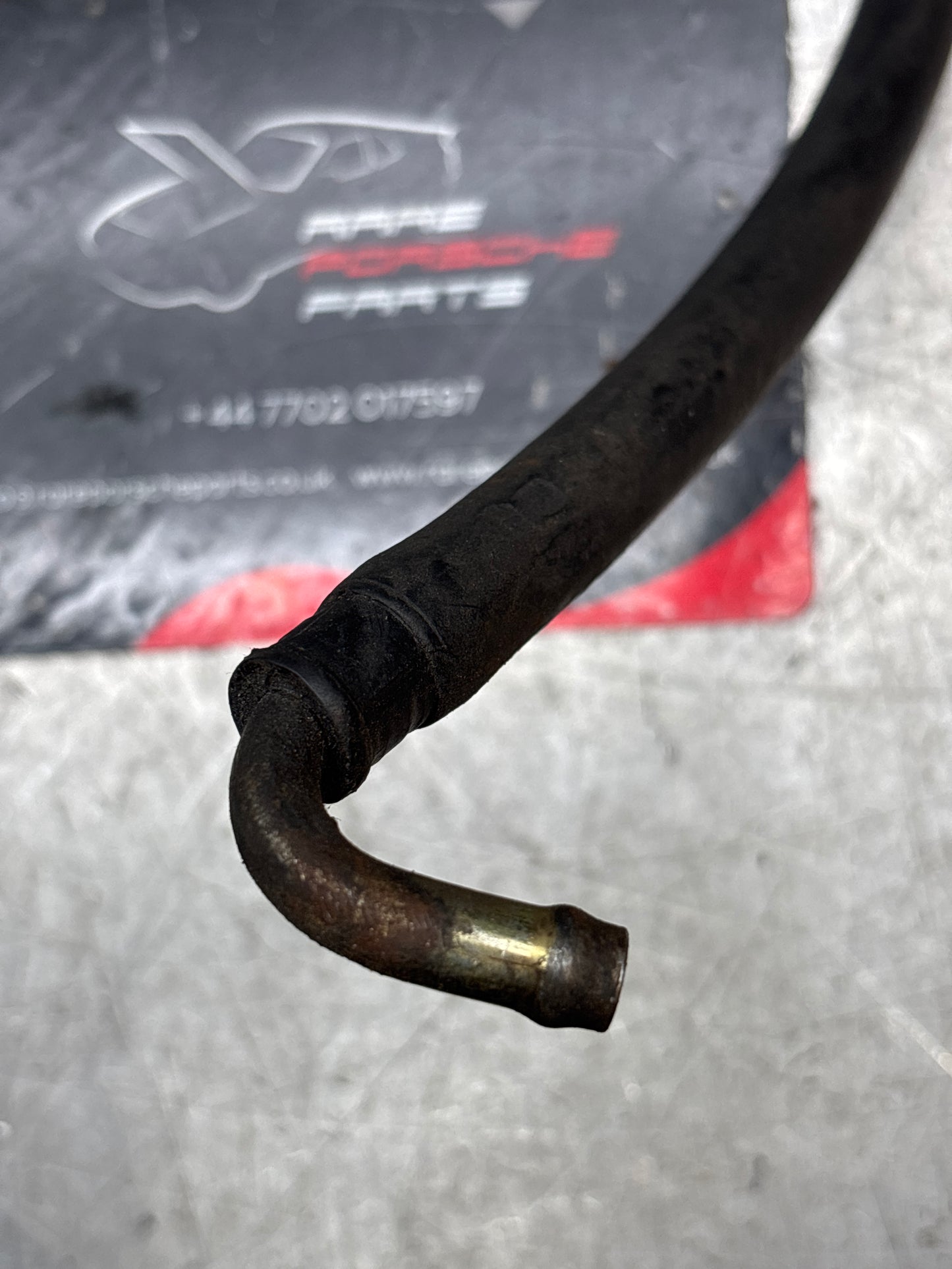 Porsche 944 hose 600mm 99918115250, with connecting piece 95111019000 used