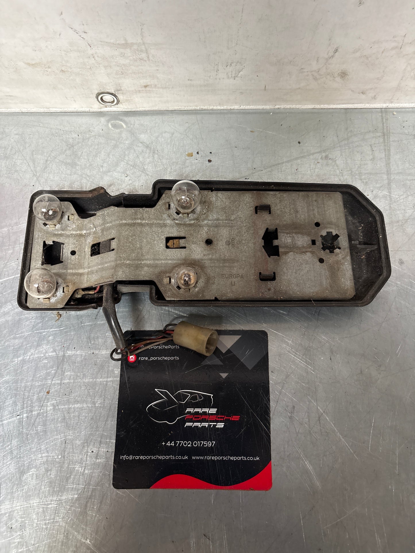 Porsche 944 Right Tail light lamp bulb holder and cover, used 477945114