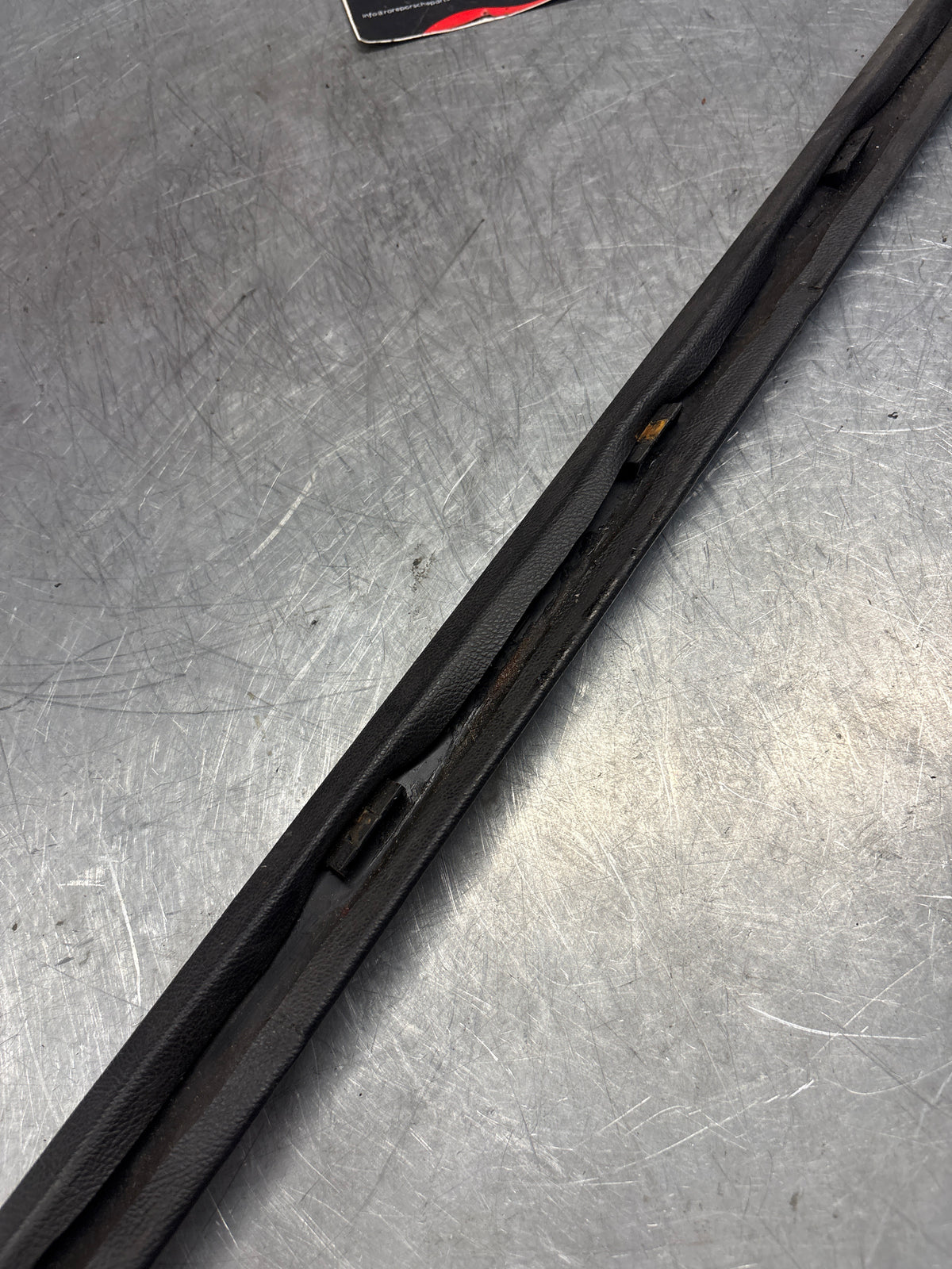 Porsche 928 tailgate trim, left, near side, black, 92855503702, used
