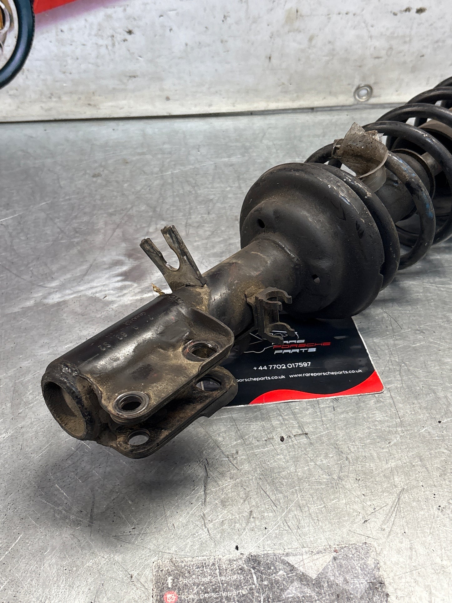 Porsche 924 Turbo / early 944 front shock absorber, used 94434303103211