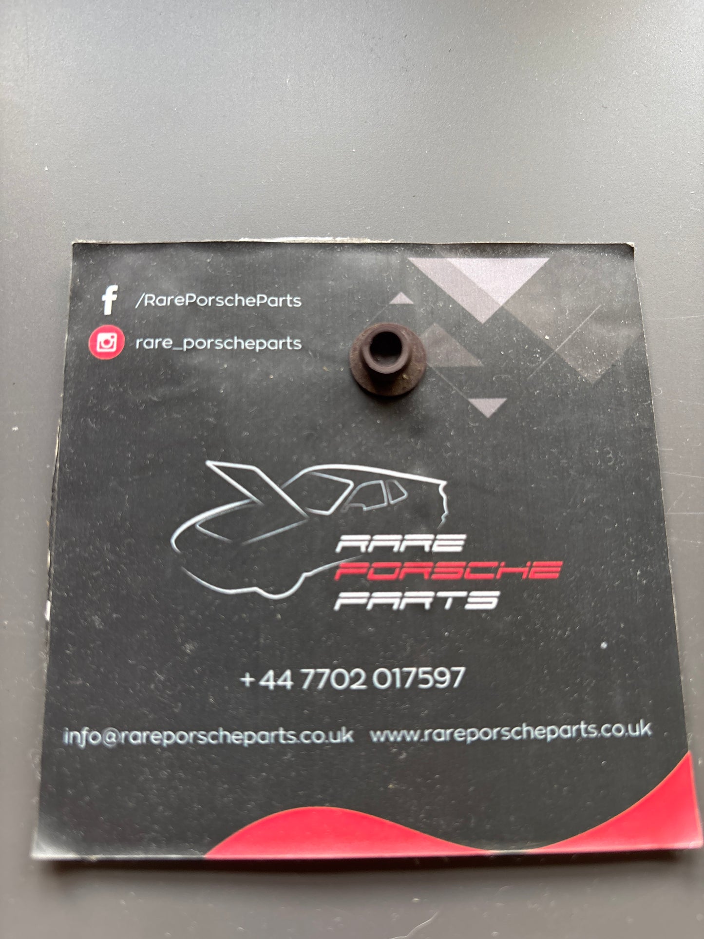 Porsche 924 944 A post/pillar screw cover brown. 91455223310, used
