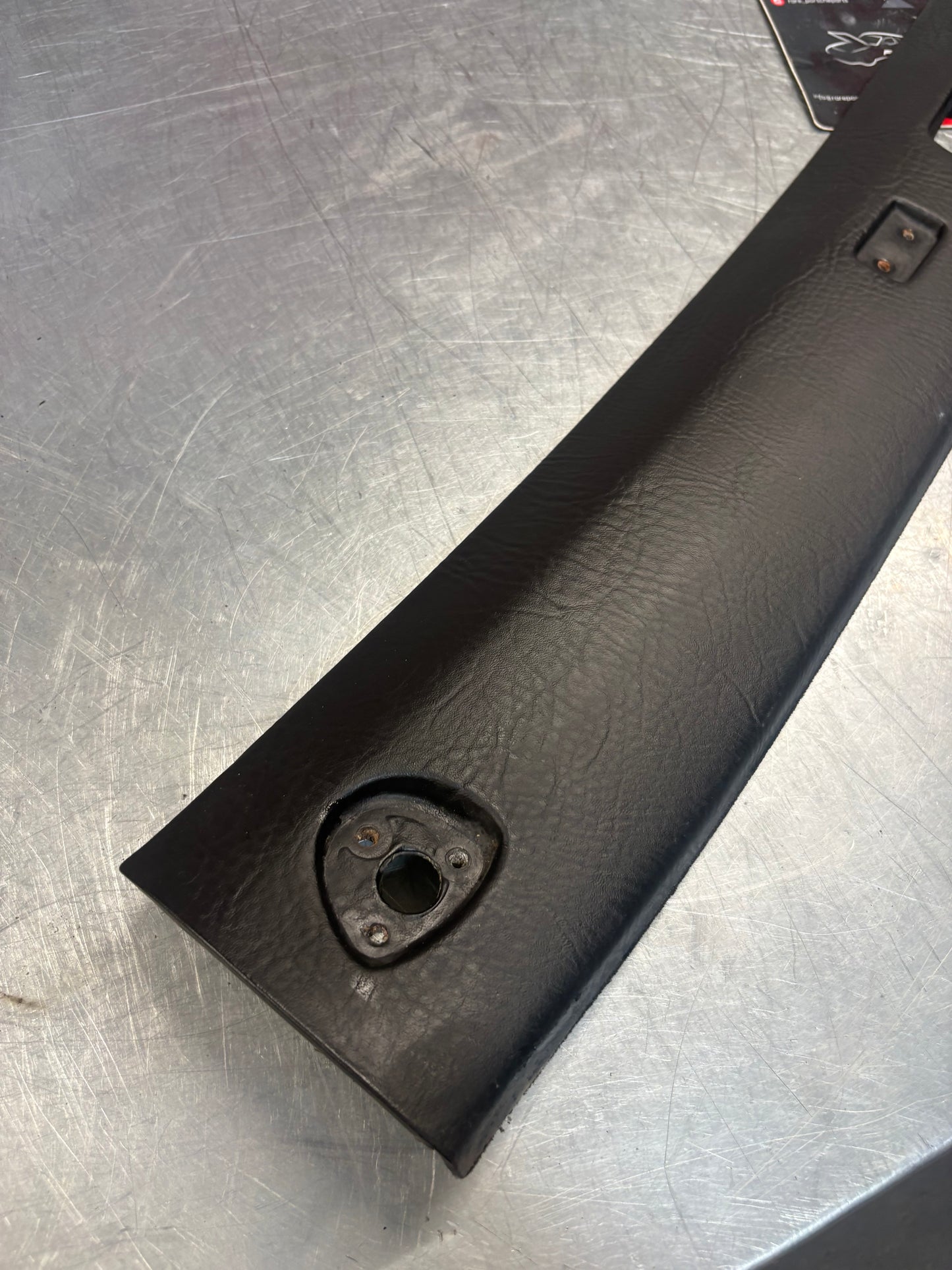 Porsche 924 944 -85.5 front roof / sun visor trim, black 477867511, used