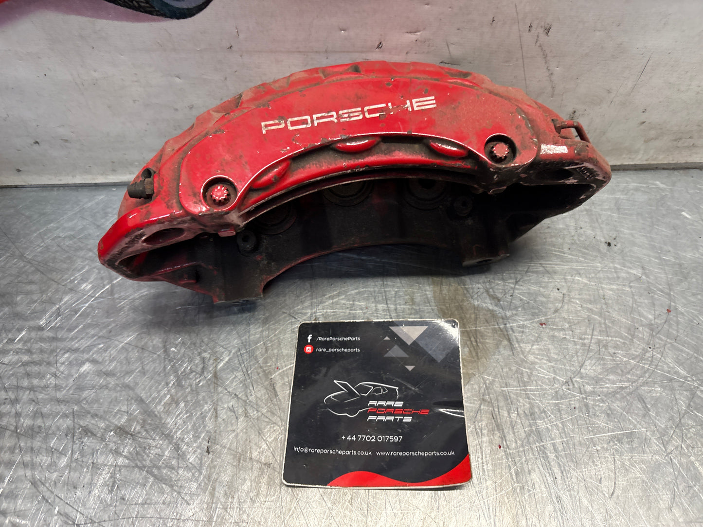 Porsche Panamera front left brake caliper, used 7PP615123C