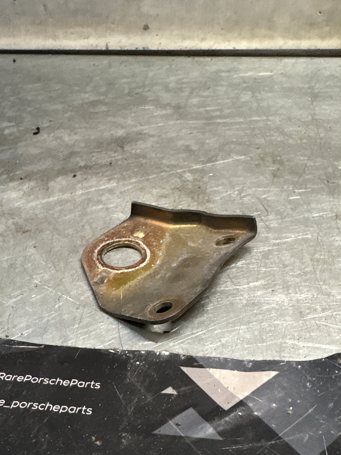 Porsche 944 fuel line support bracket, used 94411038103