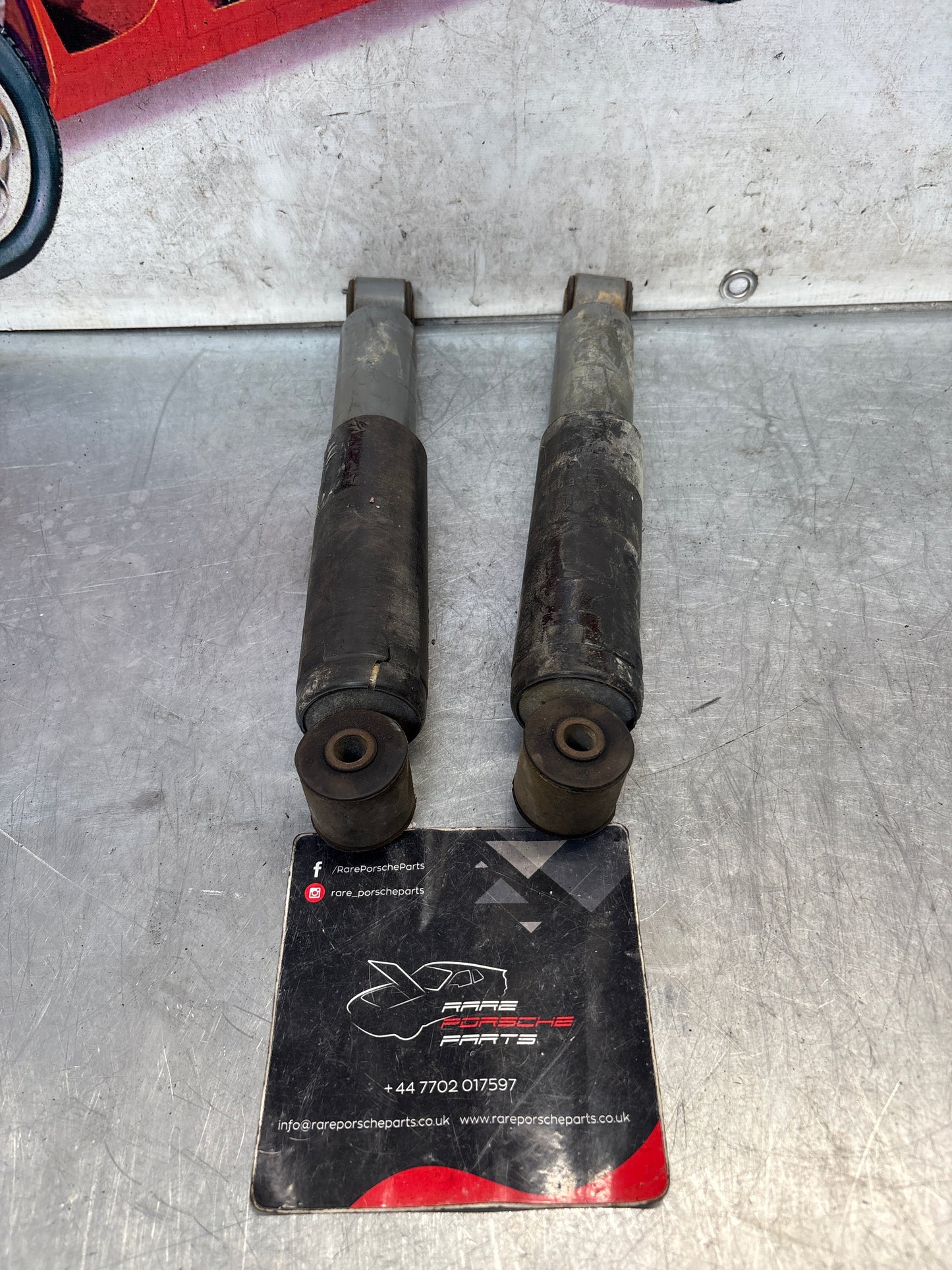 Porsche 944 86- pair of rear suspension shock absorbers, used 95133303205