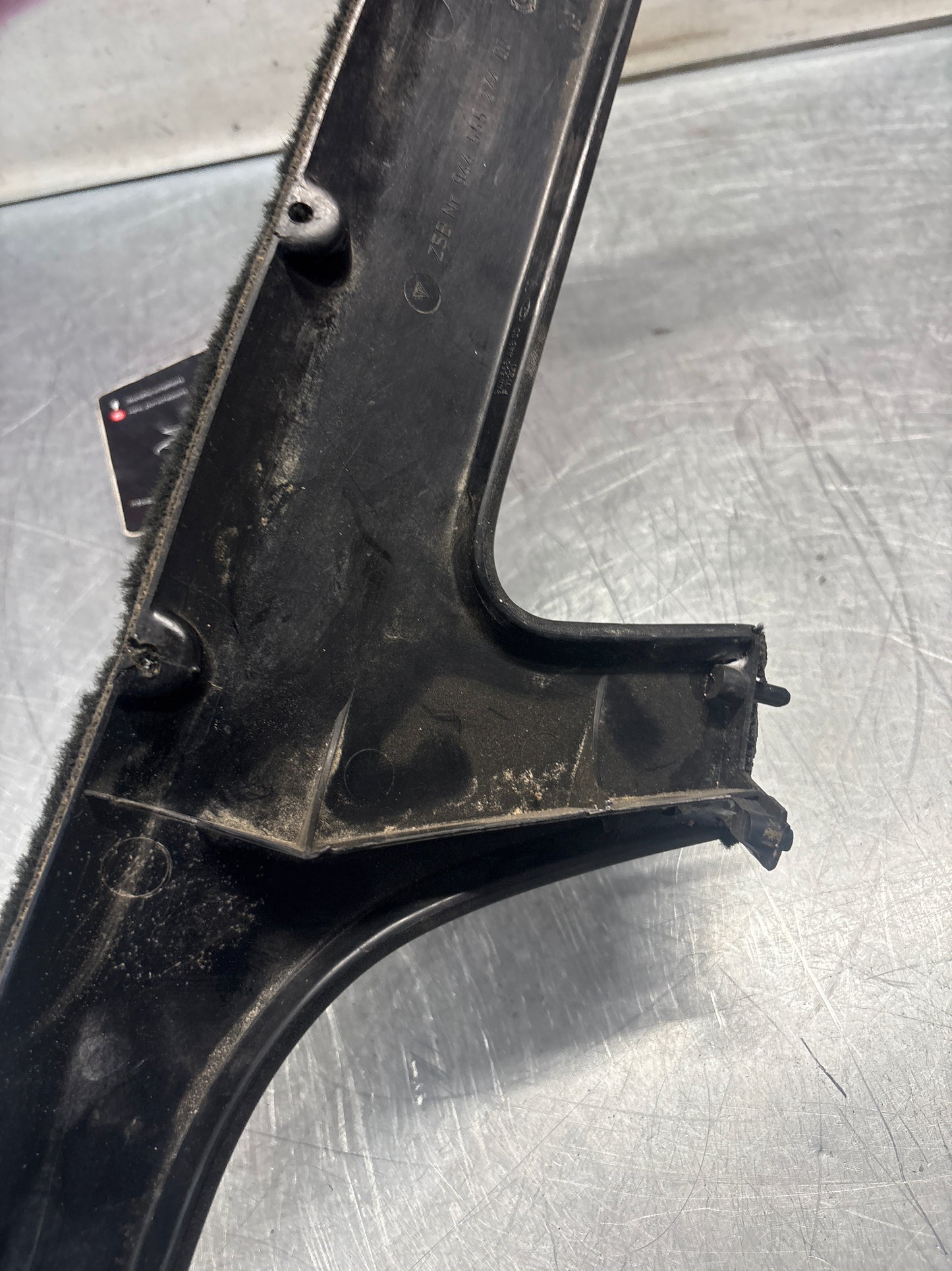 Porsche 944 right front door carpeted lower pocket, black, used 94455527400