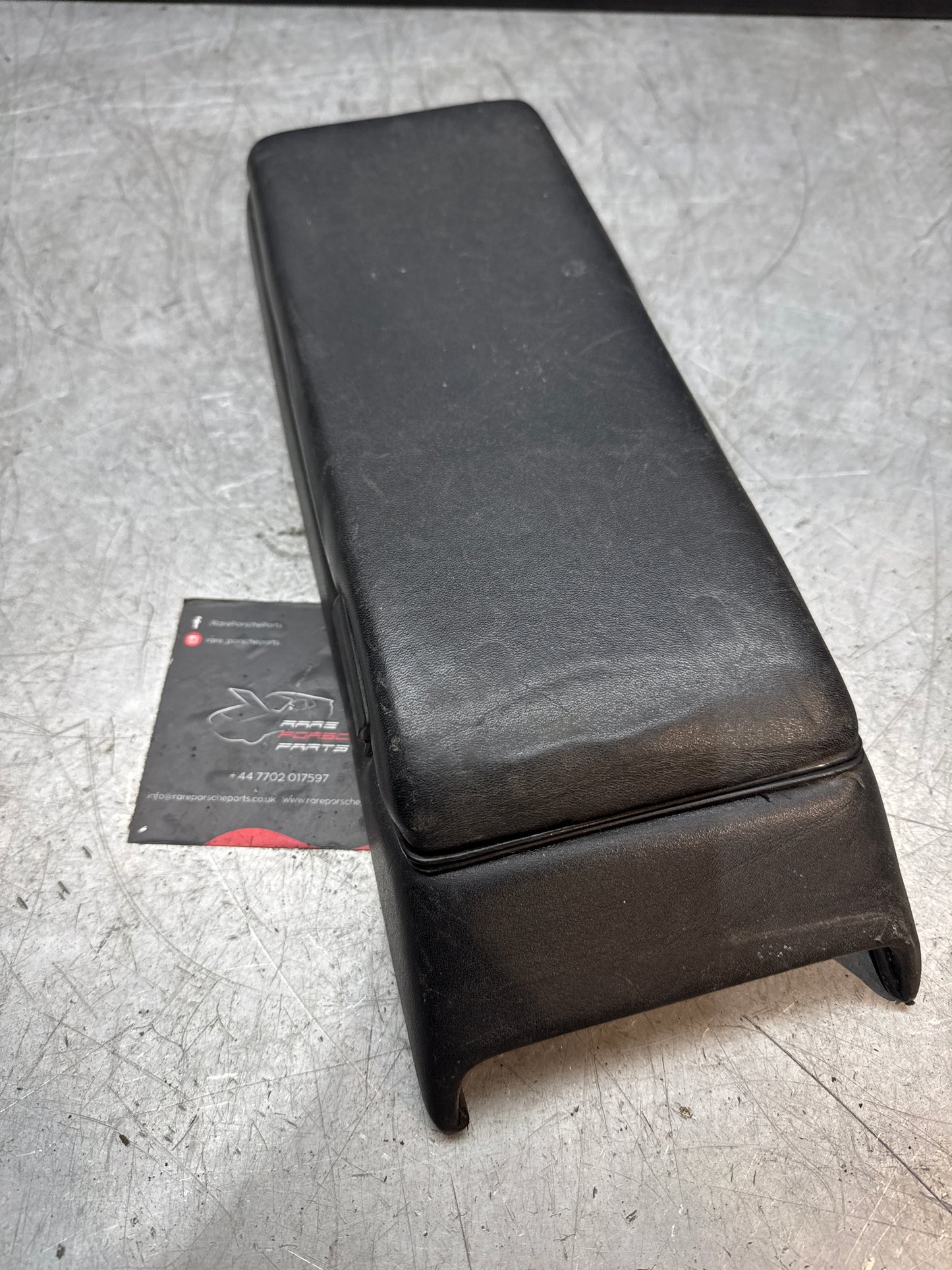 Porsche 928 92755572903 Central armrest cassette compartment black, used RHD