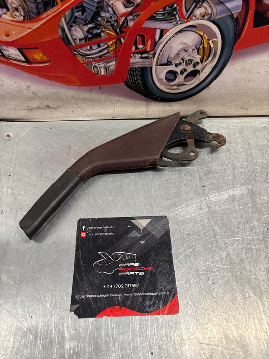 Porsche 944 handbrake lever from 85.5 burgundy, used 94442404900