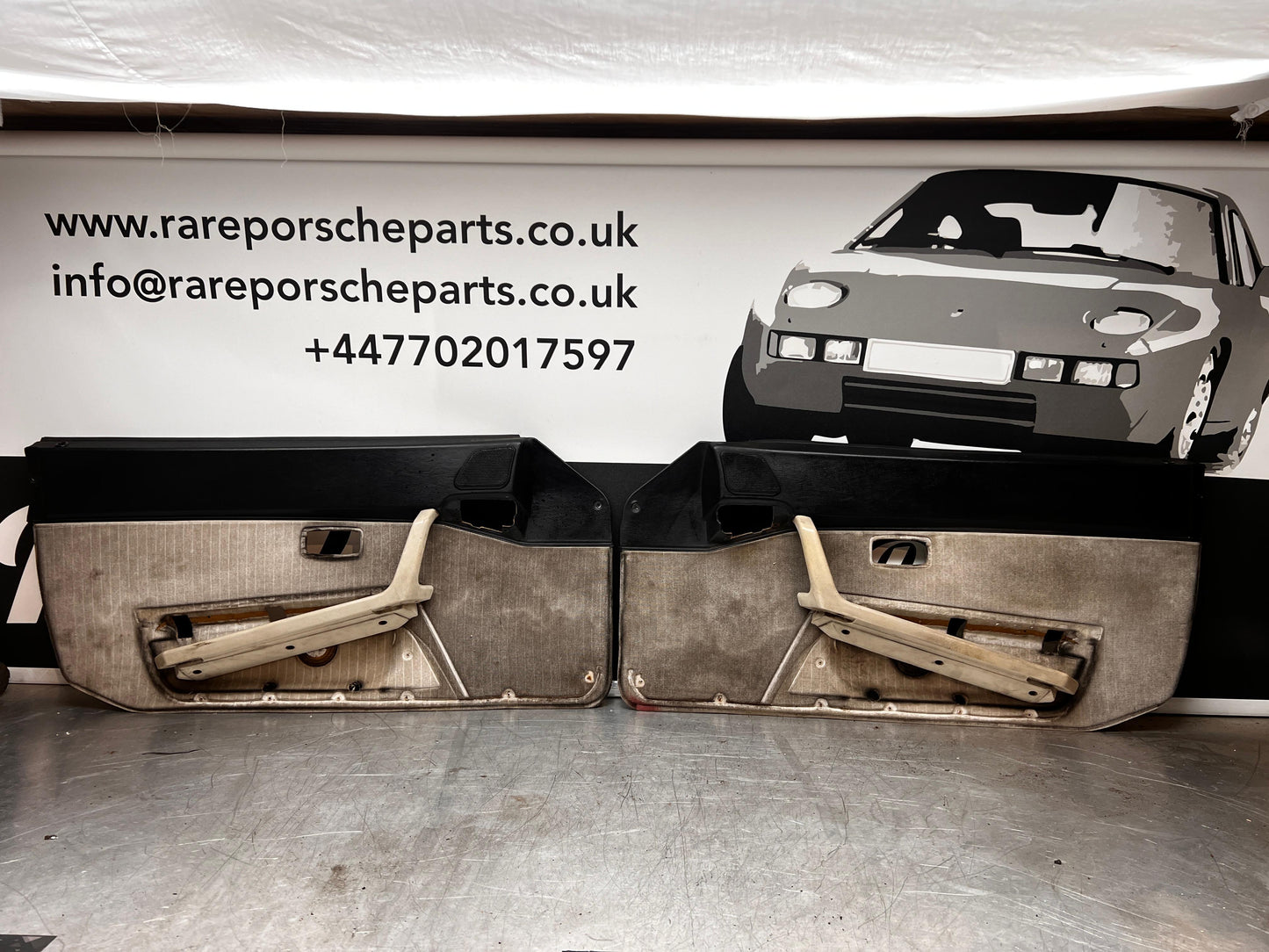 Pair Of Porsche 944 S2 black door cards 944555017 944555018 with sound package, spares or repair