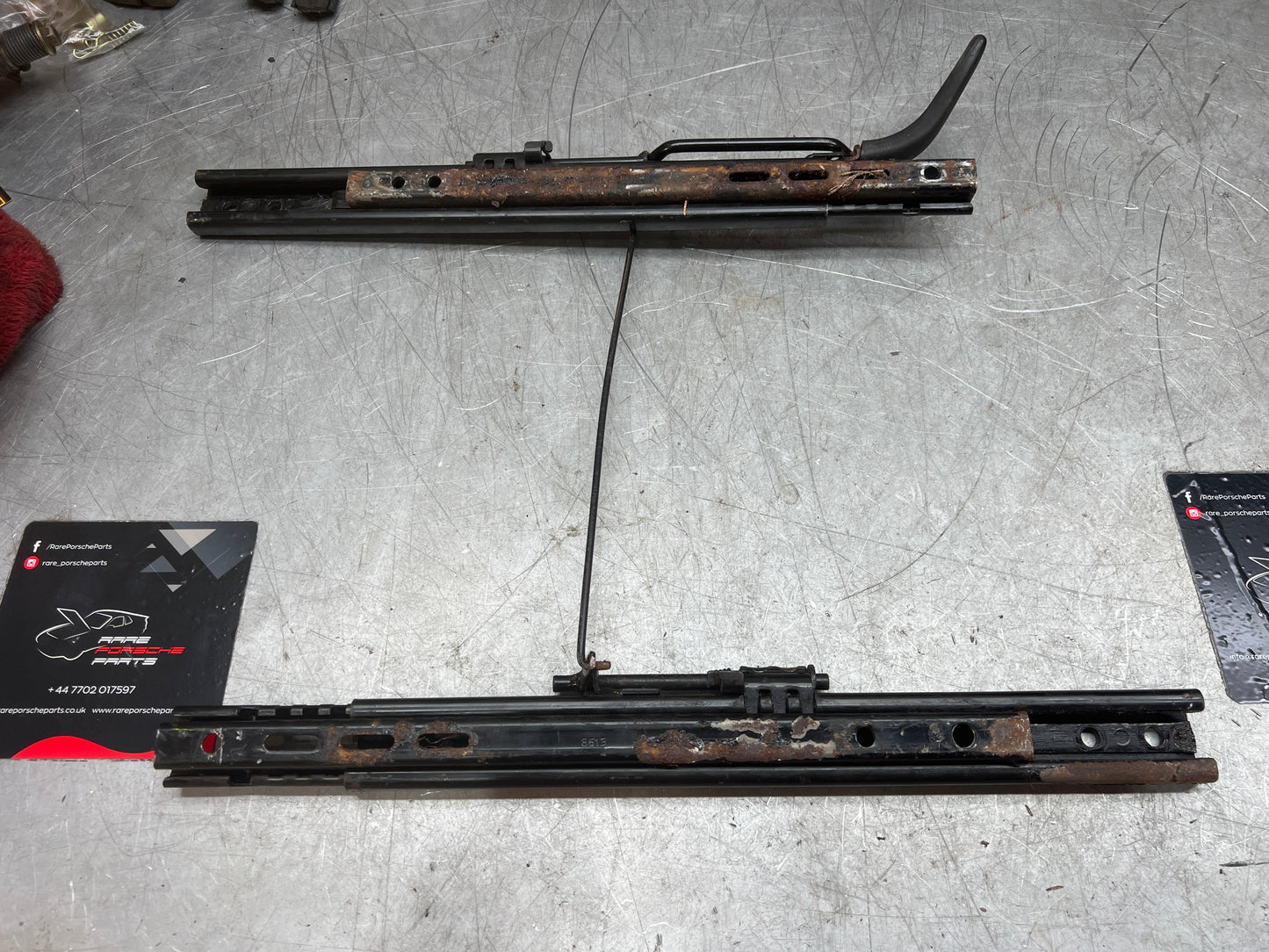 Porsche 944/968 pair of late type seat runners, manual, left side, used