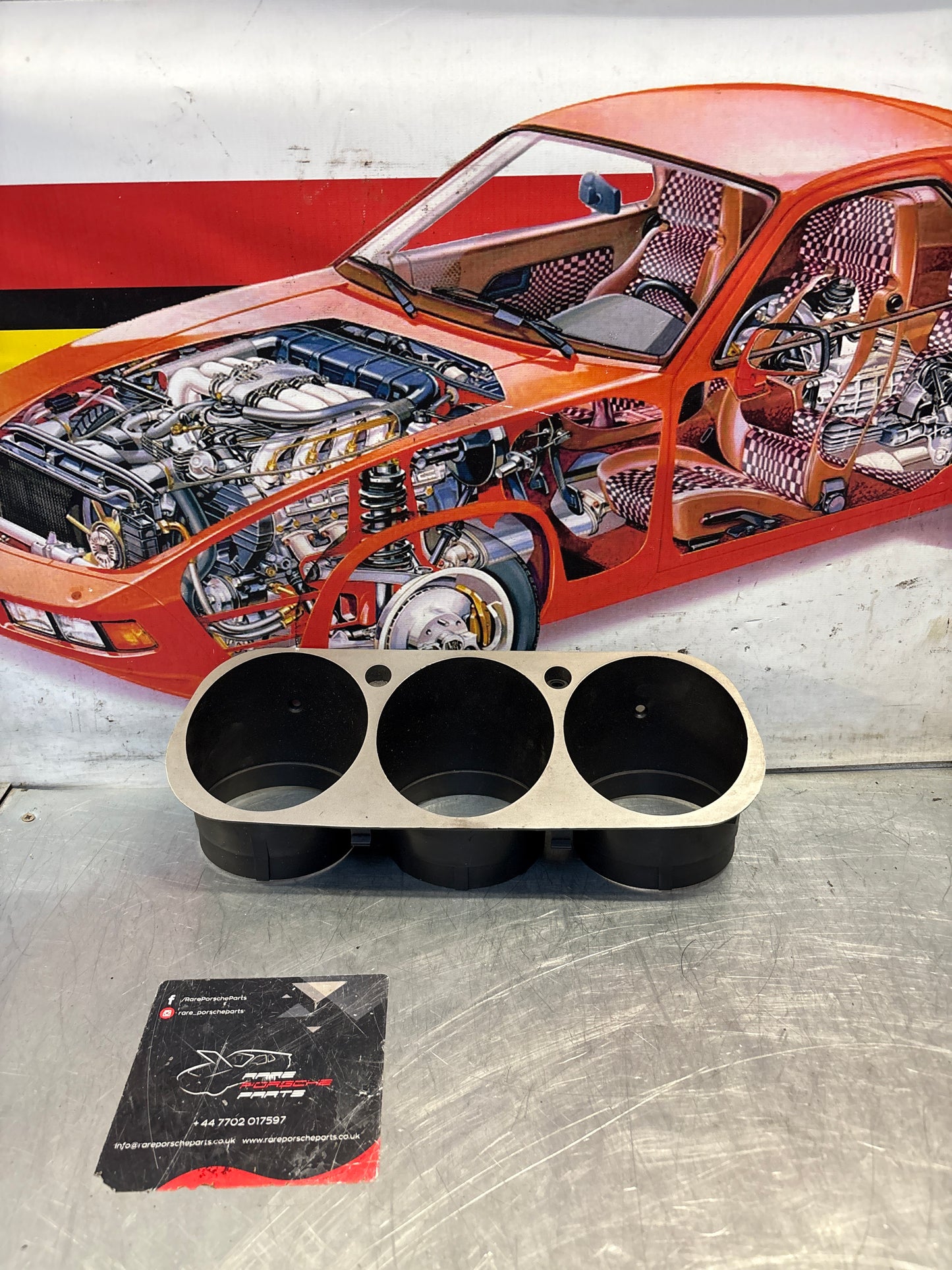 Porsche 944 dash binnacle dial panel speedo surround with high beam hole 477857283 silver, used