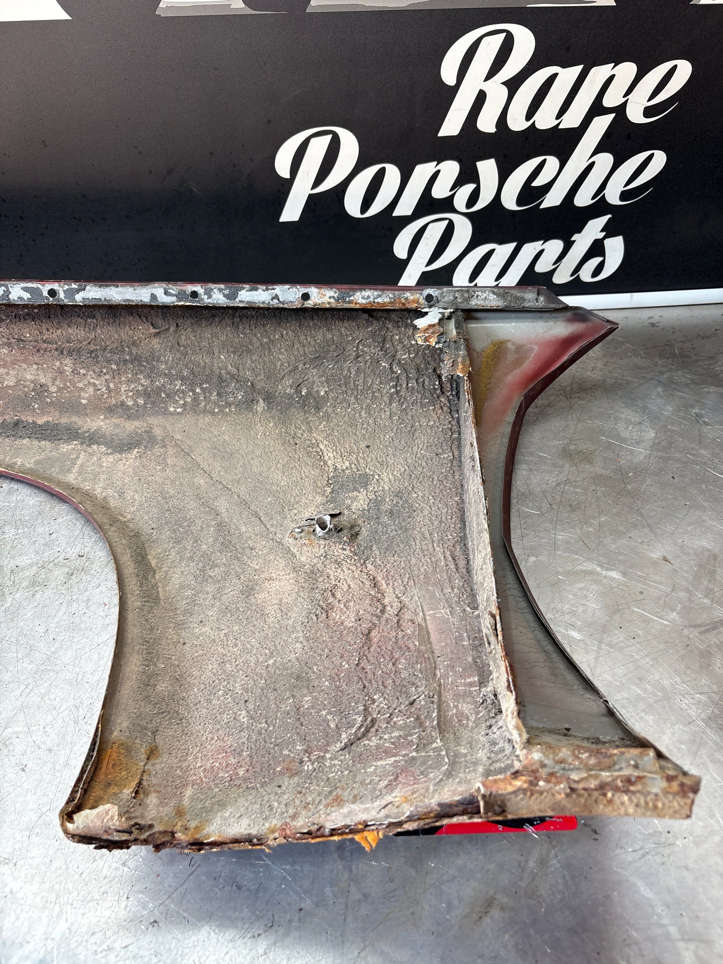 Porsche 944, early front right wing, in need of repair