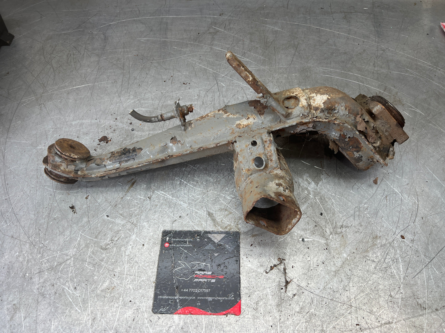 Porsche 924 944  -85.5 Rear left trailing arm, 94433102100