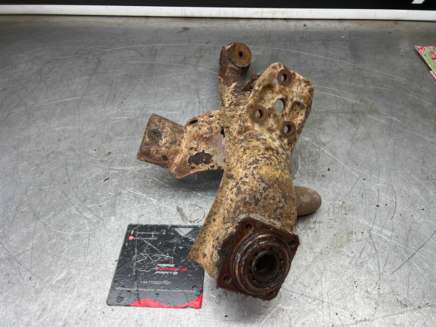 Porsche 924 944  -85.5 Rear left trailing arm, 94433102100