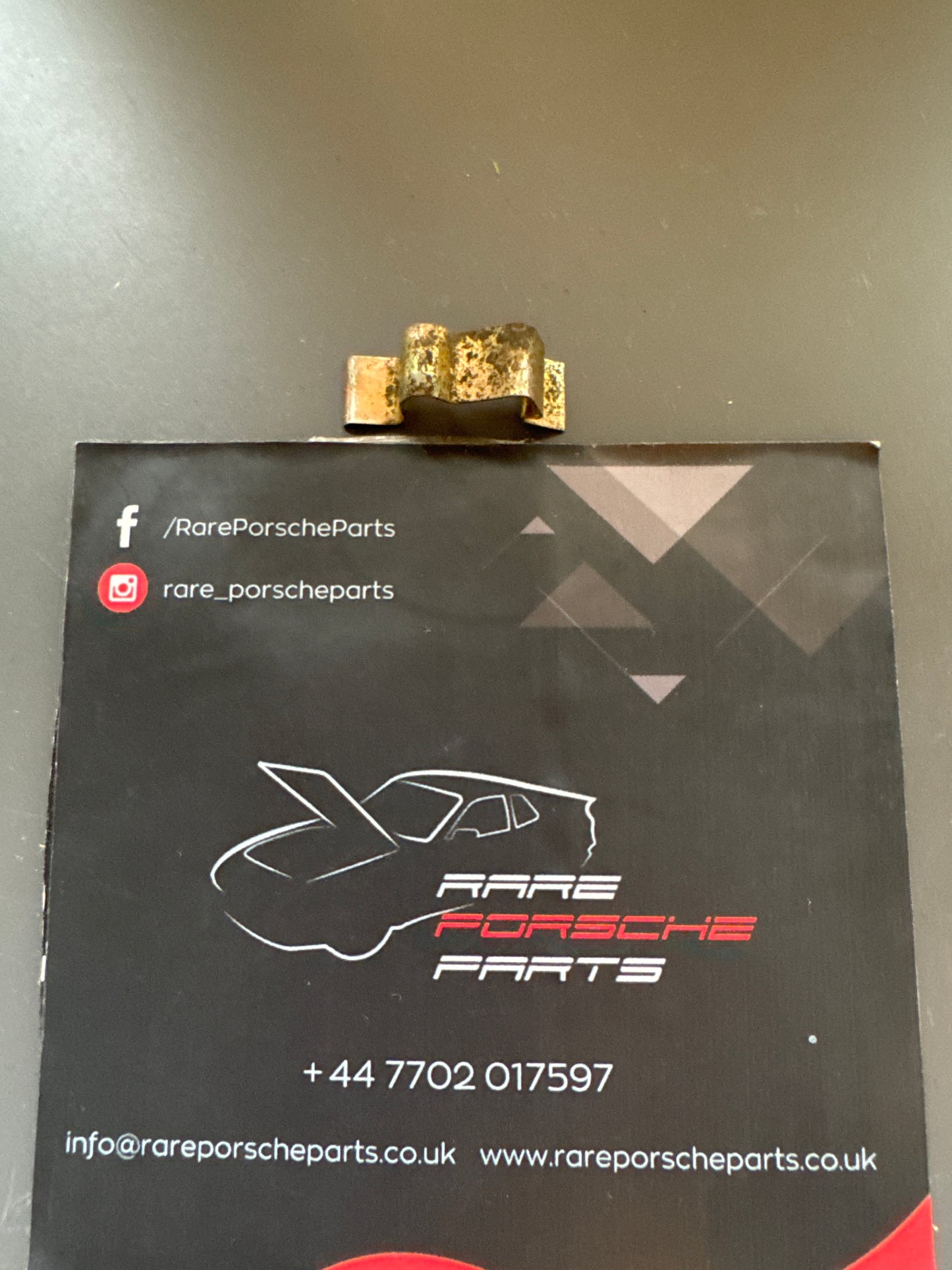 Porsche spring clip 477819343 used