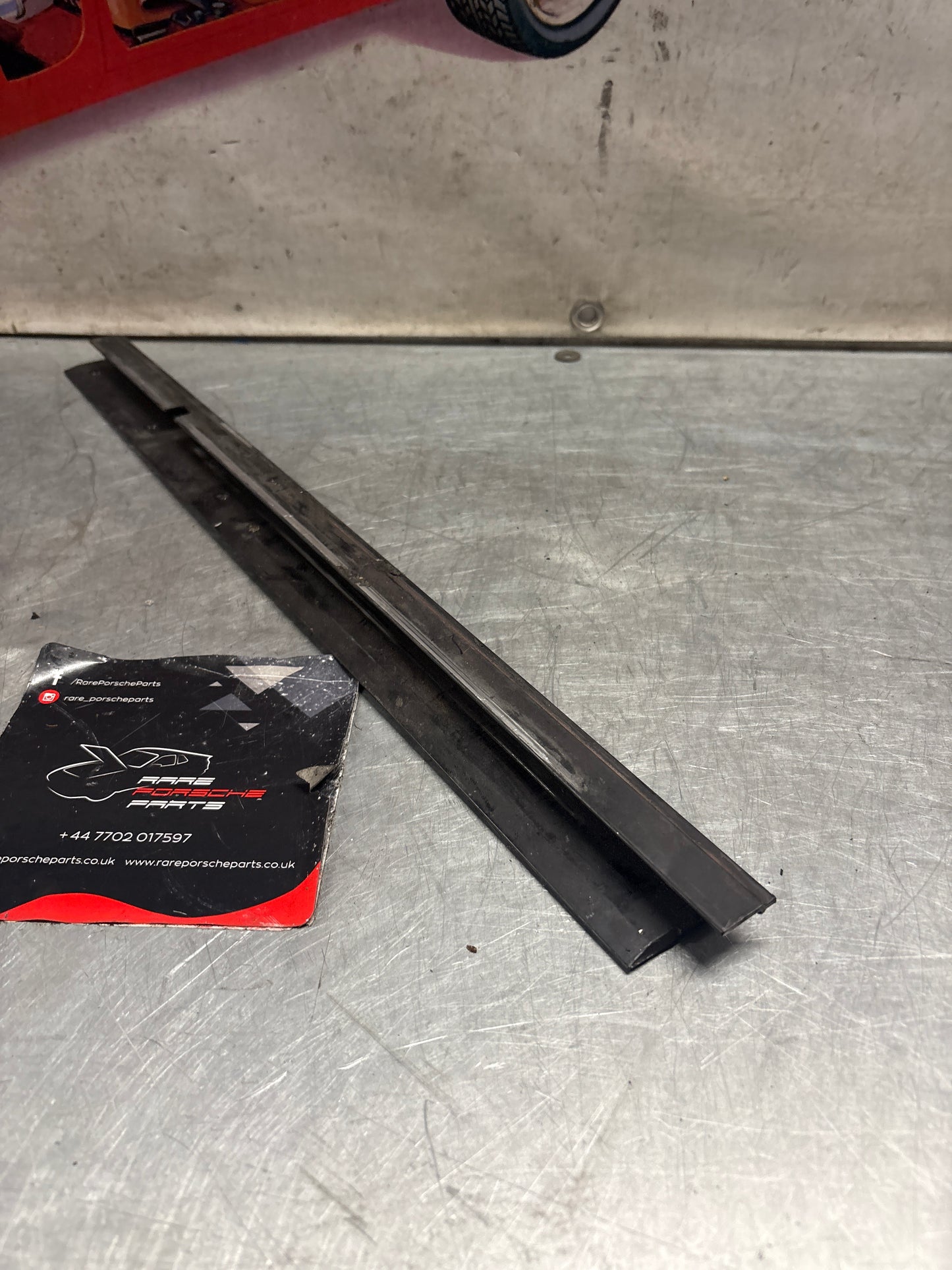 Porsche 928 left sunroof guide rail, used 92856401641