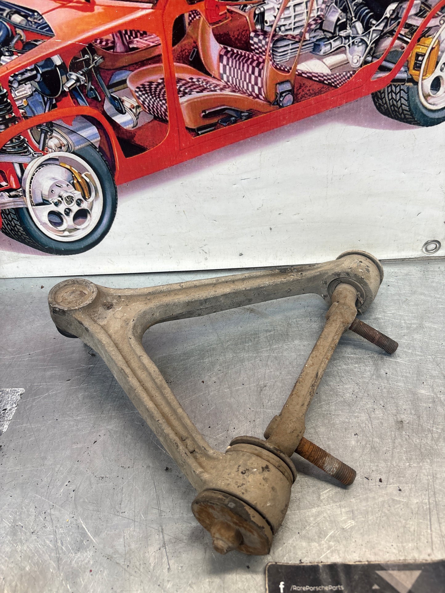 Porsche 928 front upper left control arm, used 92834145722