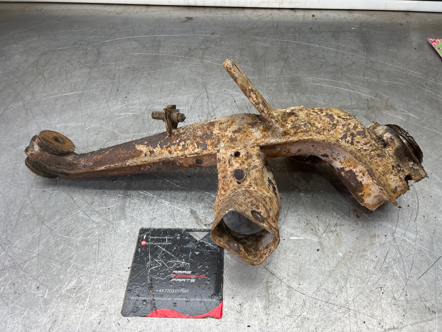 Porsche 924 944  -85.5 Rear left trailing arm, 94433102100