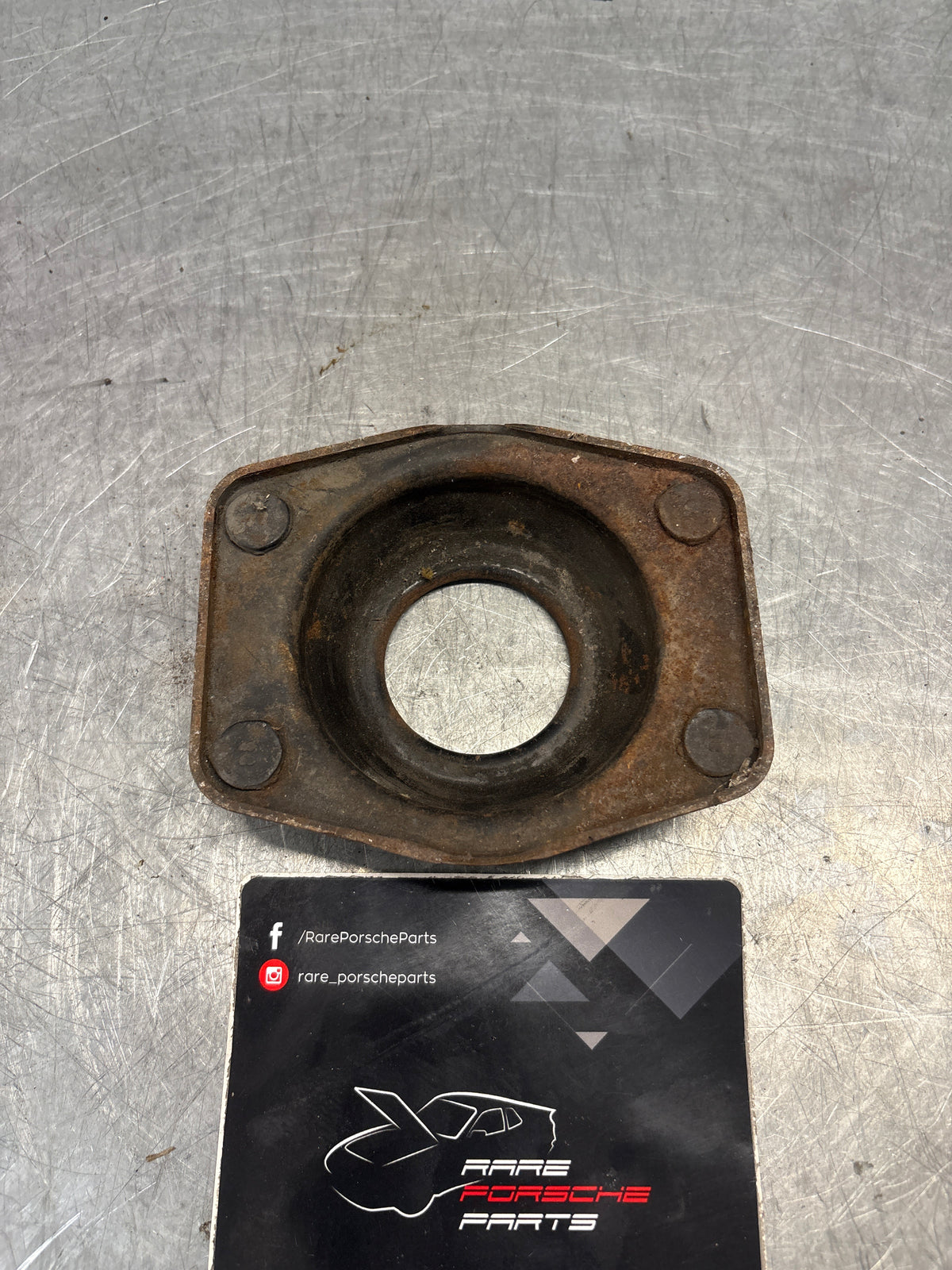 Porsche 924 / 944 front suspension bearing flange, 477412345, used