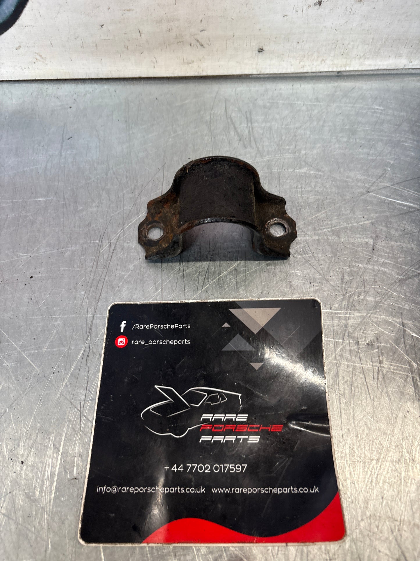 Porsche 928 front anti roll bar clamp, 92834377700 used