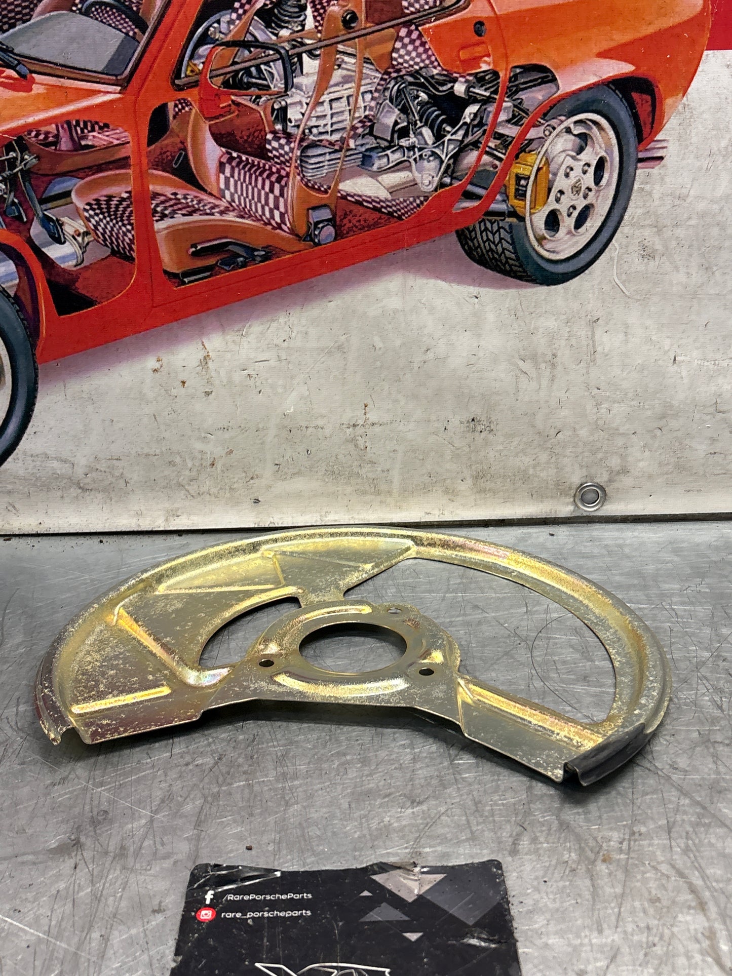 Porsche 968 front left brake dust cover plate, used 95135180502