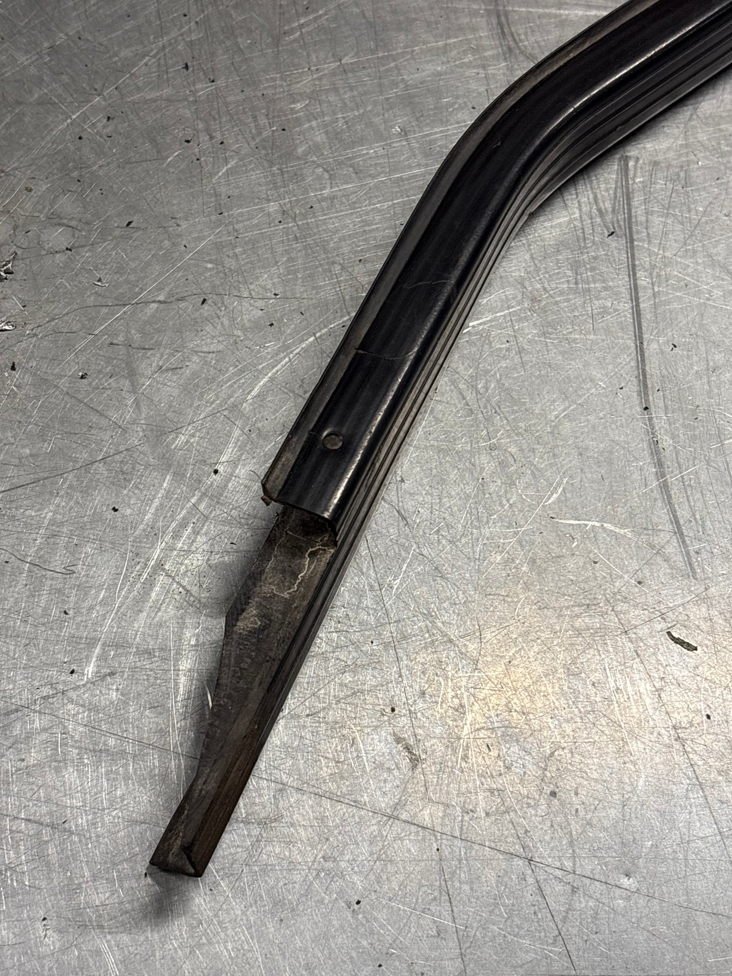 Porsche 944 85.5- left sill trim, scuff plate used 94455112100 cracked