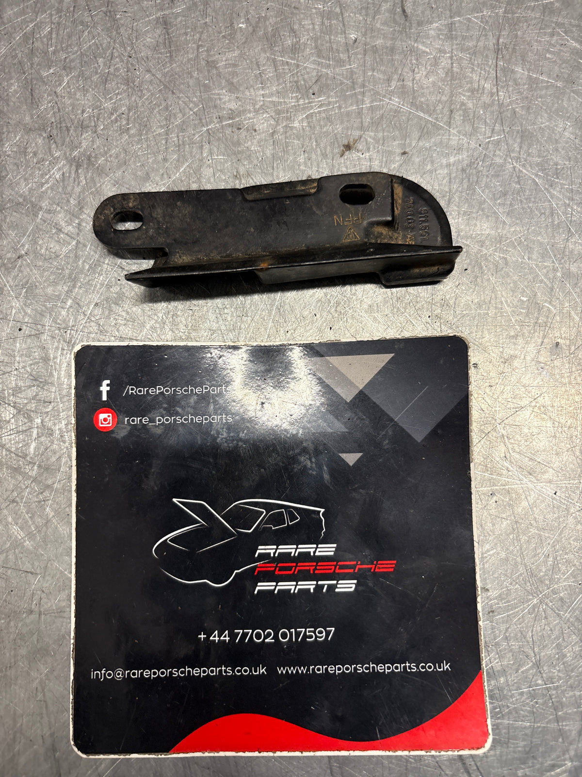 Porsche 911 964 cabriolet right roof latch guide plate, used 91156174003