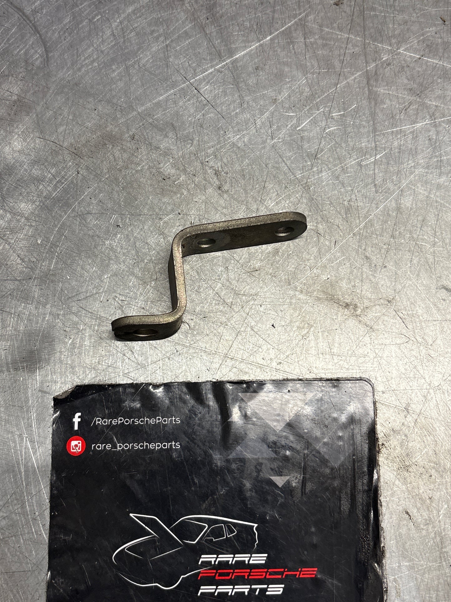 Porsche 924 LHD exhaust manifold bracket, used 047133239