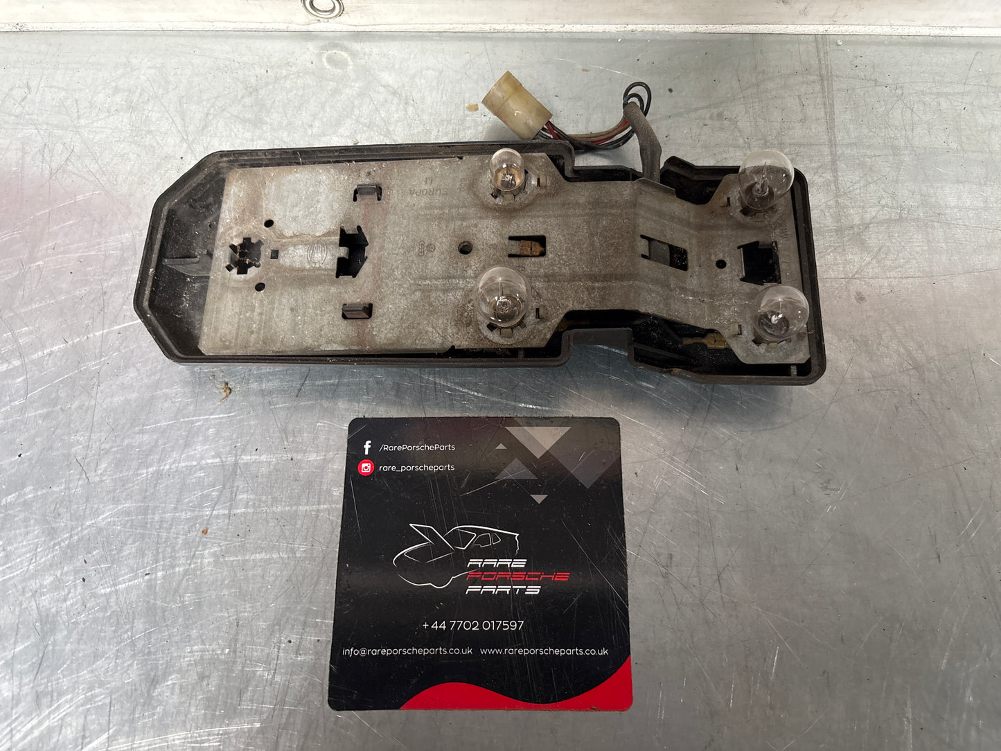 Porsche 944 Right Tail light lamp bulb holder and cover, used 477945114