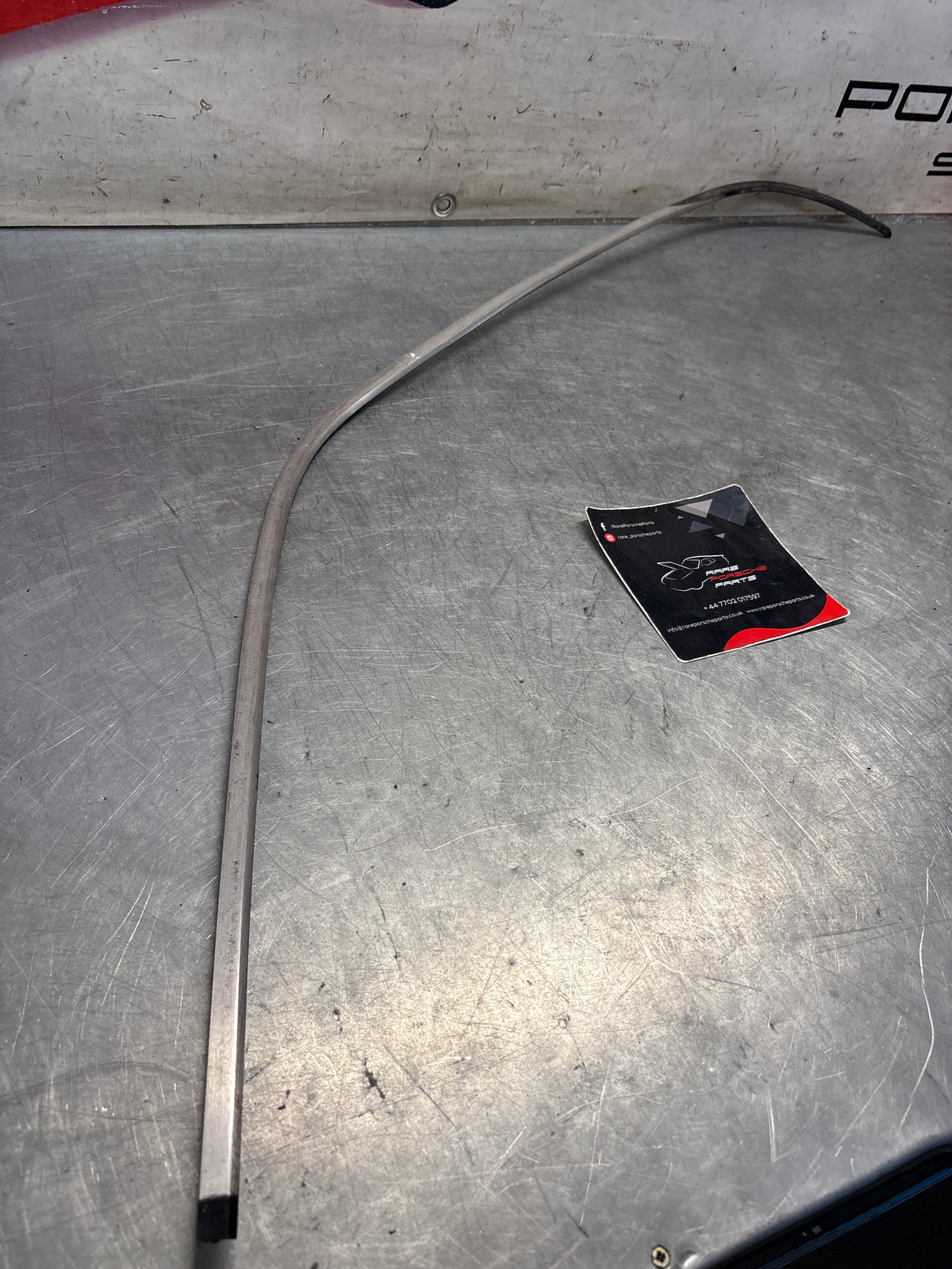 Porsche 928 rear left quarter glass cover strip, used 92854341708