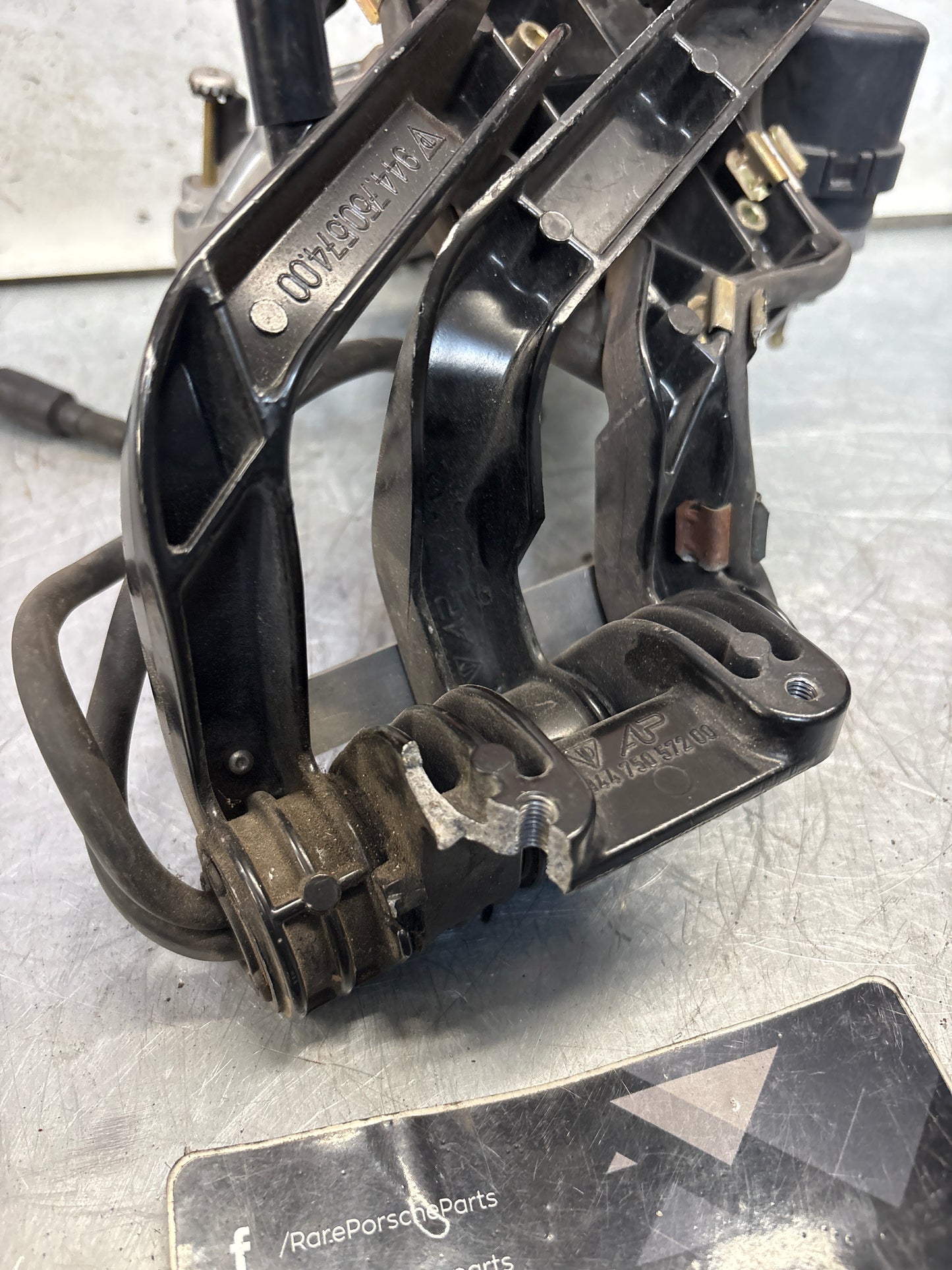 Porsche 968 right headlight swivel frame, for spares or repair 94475057200 / 94475057400 / 94475037800
