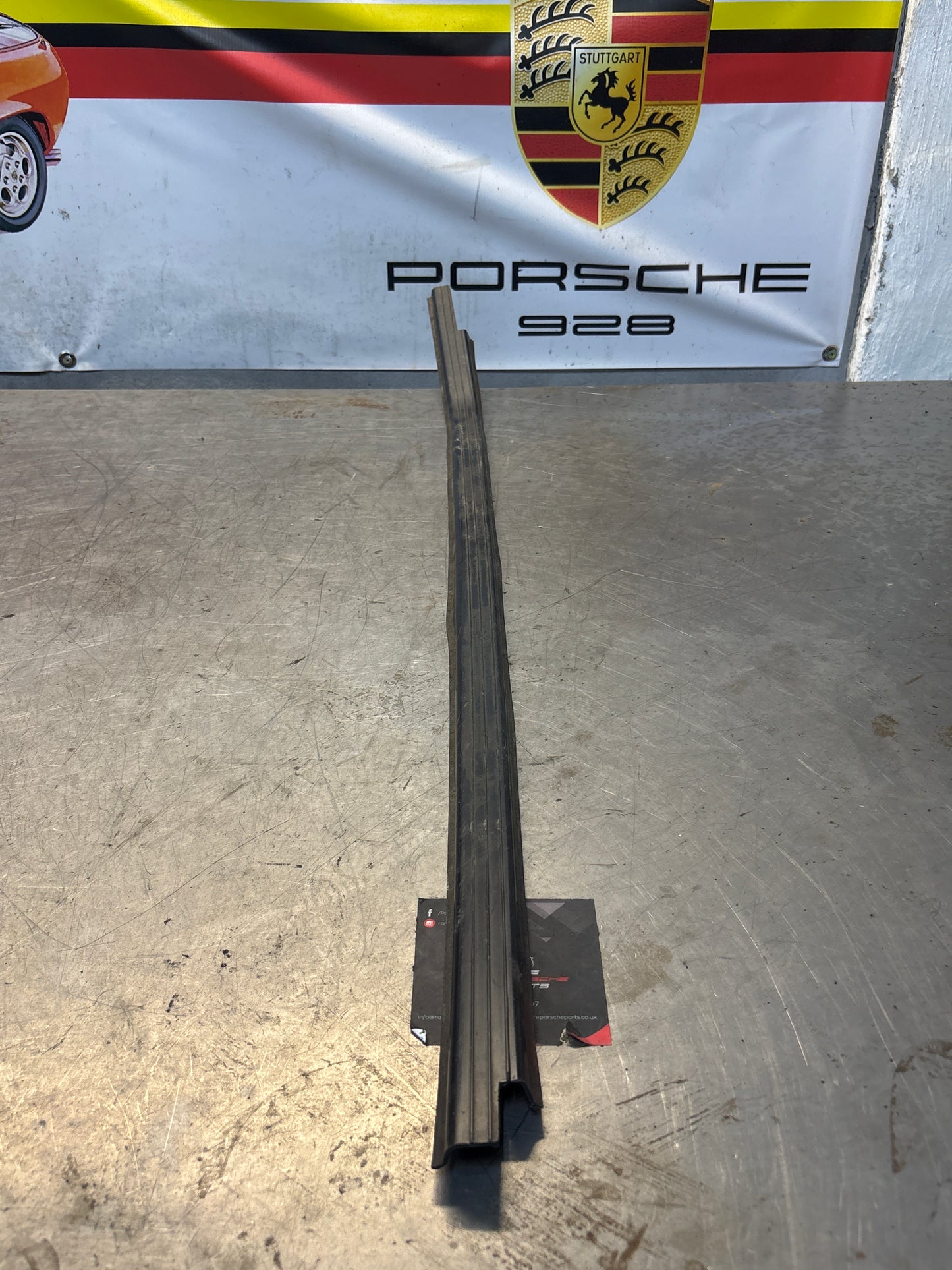 Porsche early 924/944 left sill trim, used 477853657A