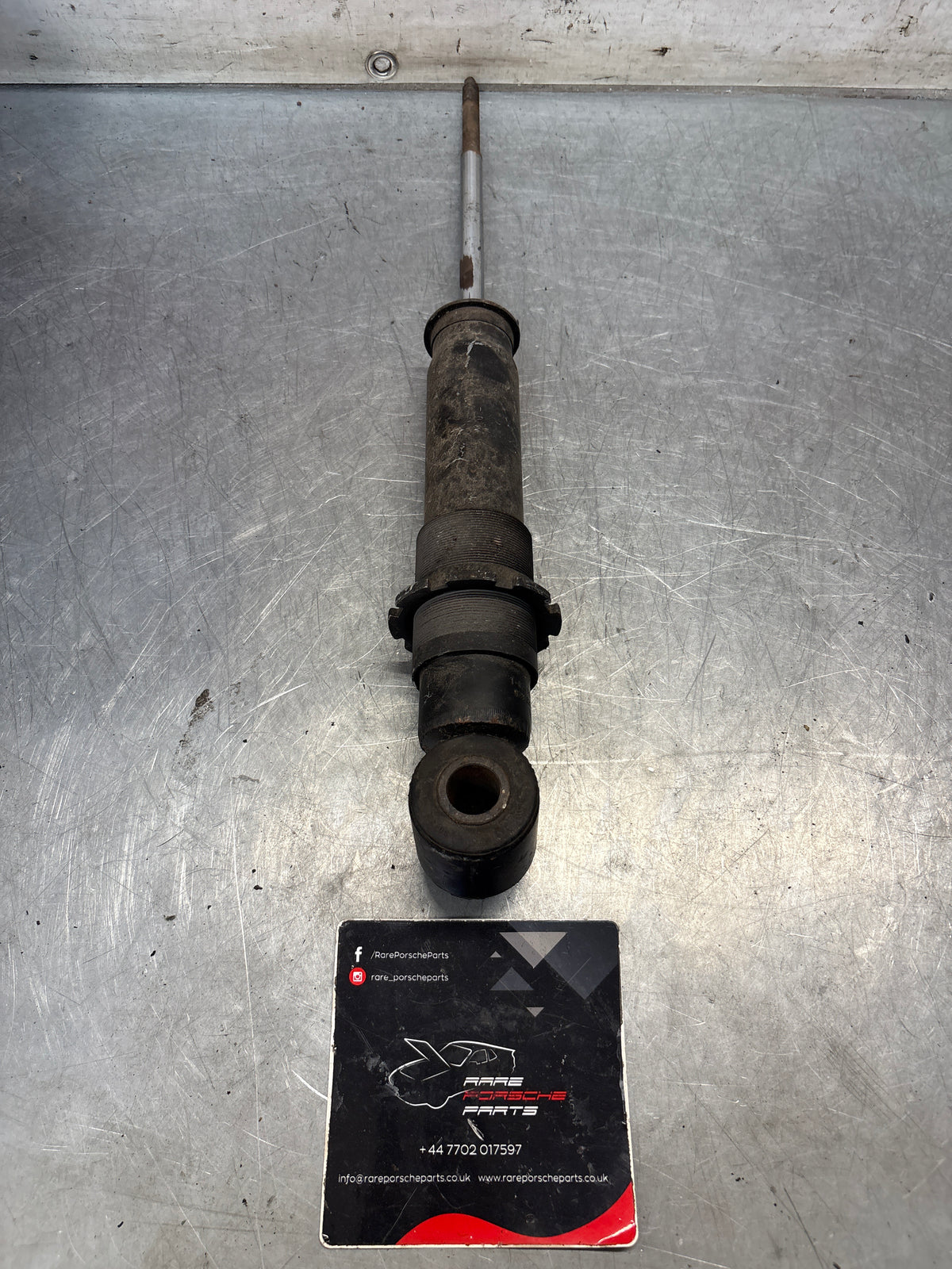 Porsche 928 rear shock absorber, used 92833305116