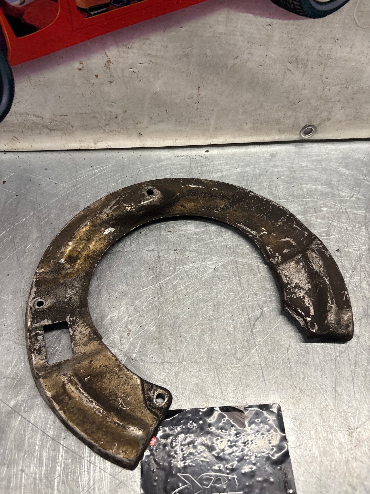 Porsche 928 S4 rear right brake dust cover plate, used 92835281405