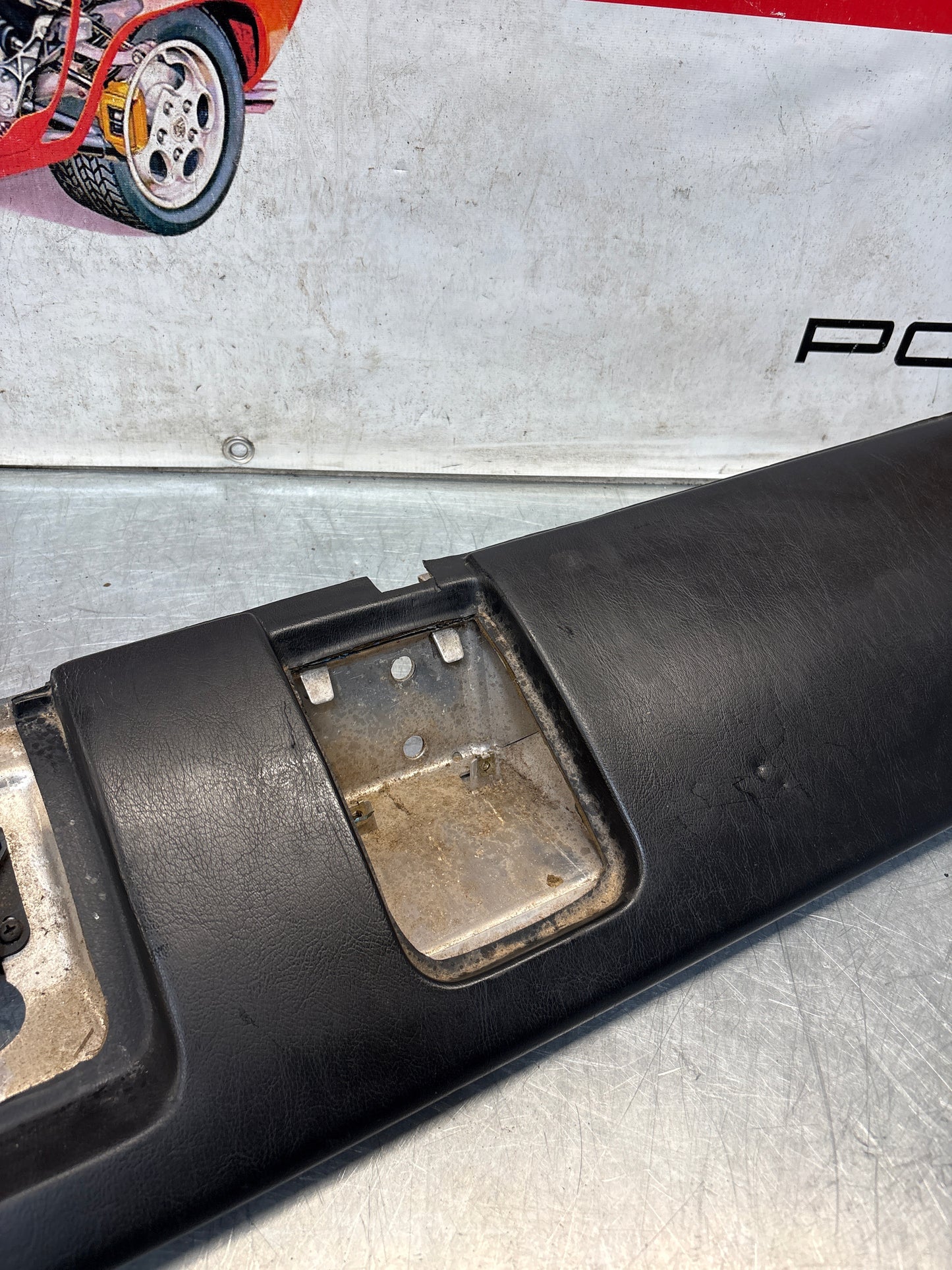 Porsche 911 964 dashboard lower knee protection trim, black leather, used 96455207304 / 96455207300