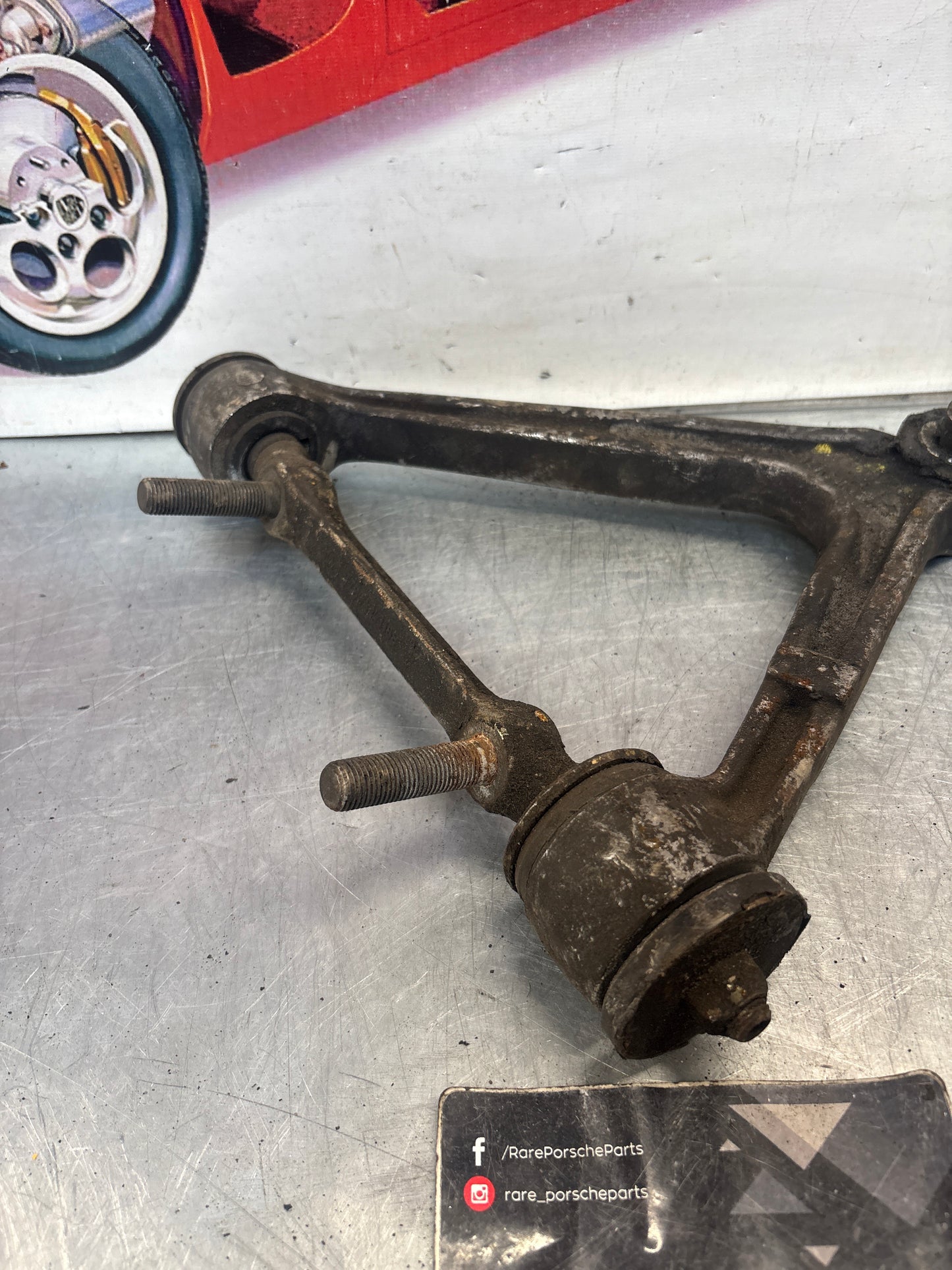 Porsche 928 front upper left control arm, used 92834145722