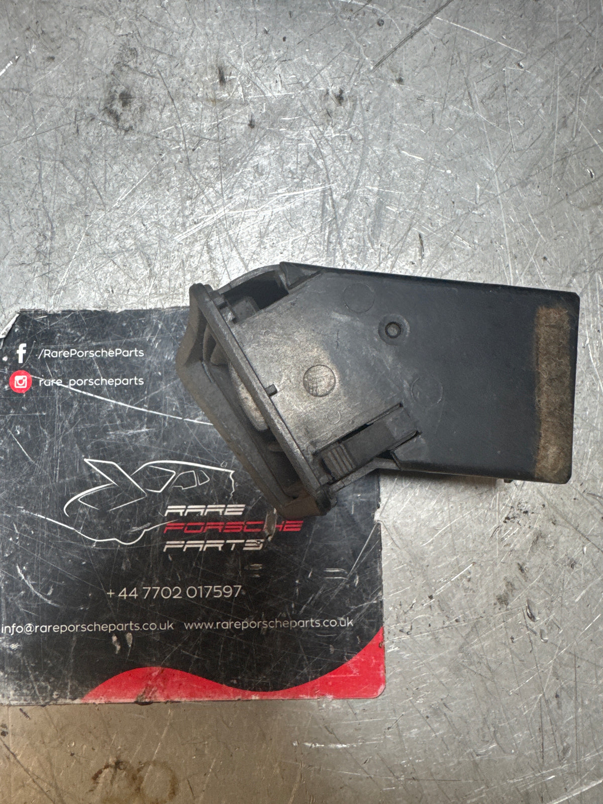 Porsche 924/944 Black dash air vent. Left hand, 477819231, used spares or repair