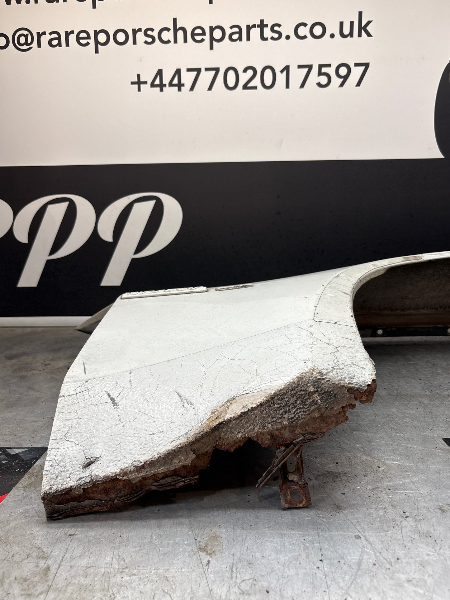 Porsche 944, early front right wing, in need of repair