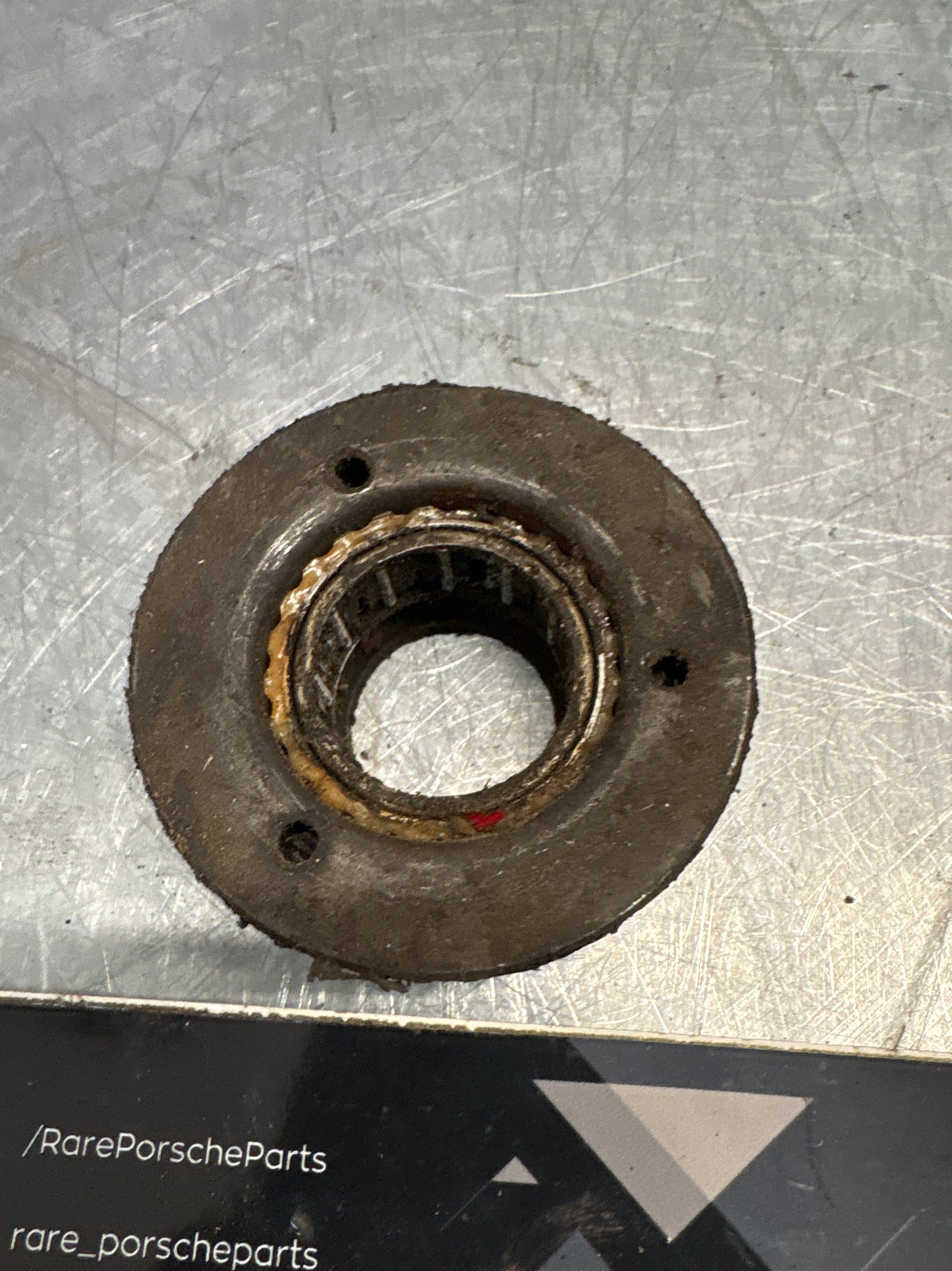 Porsche 924/944 steering coloumn cover lower bearing, used 477419059