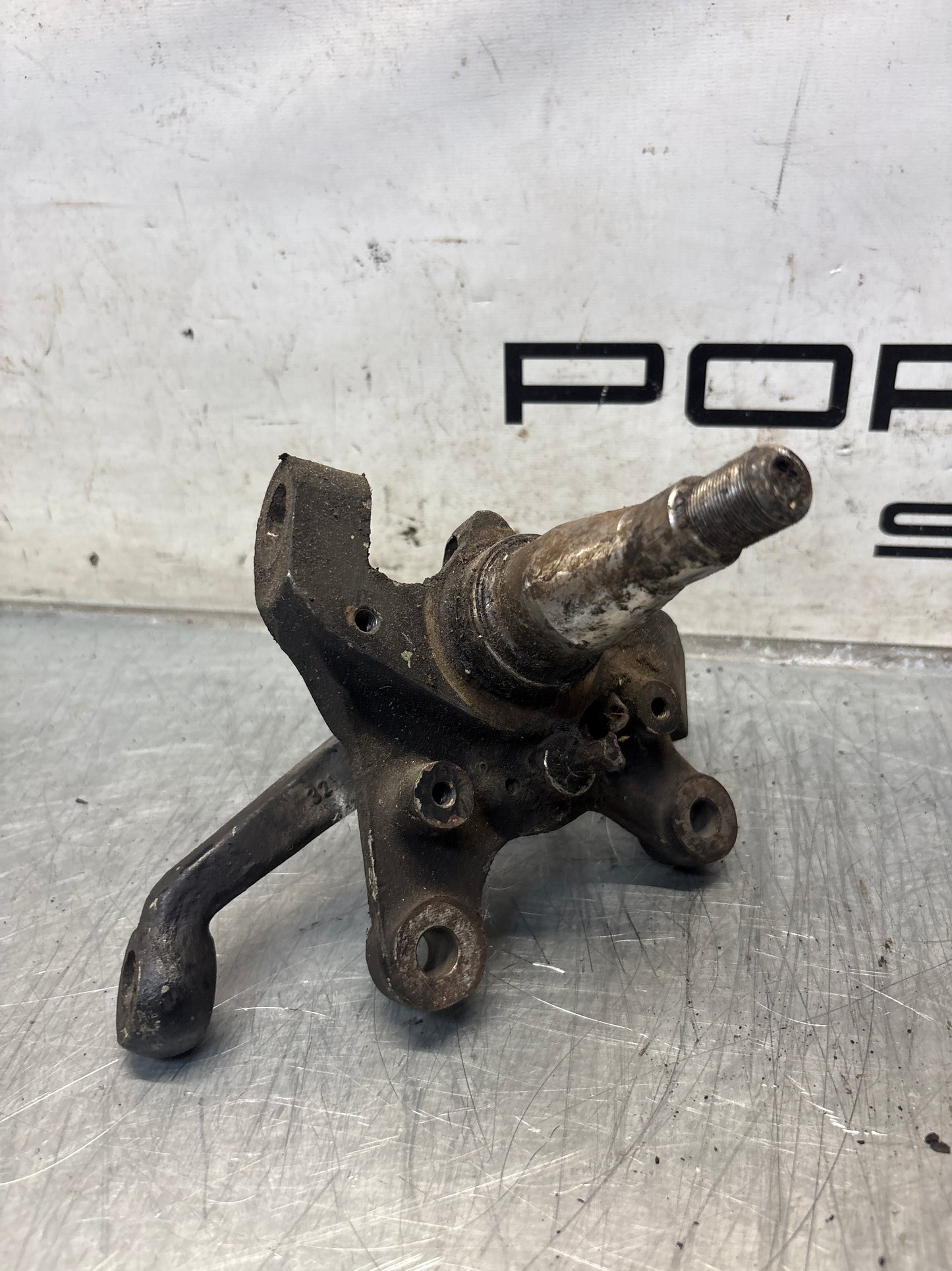 Porsche 928 left steering spindle knuckle, used 92834105717
