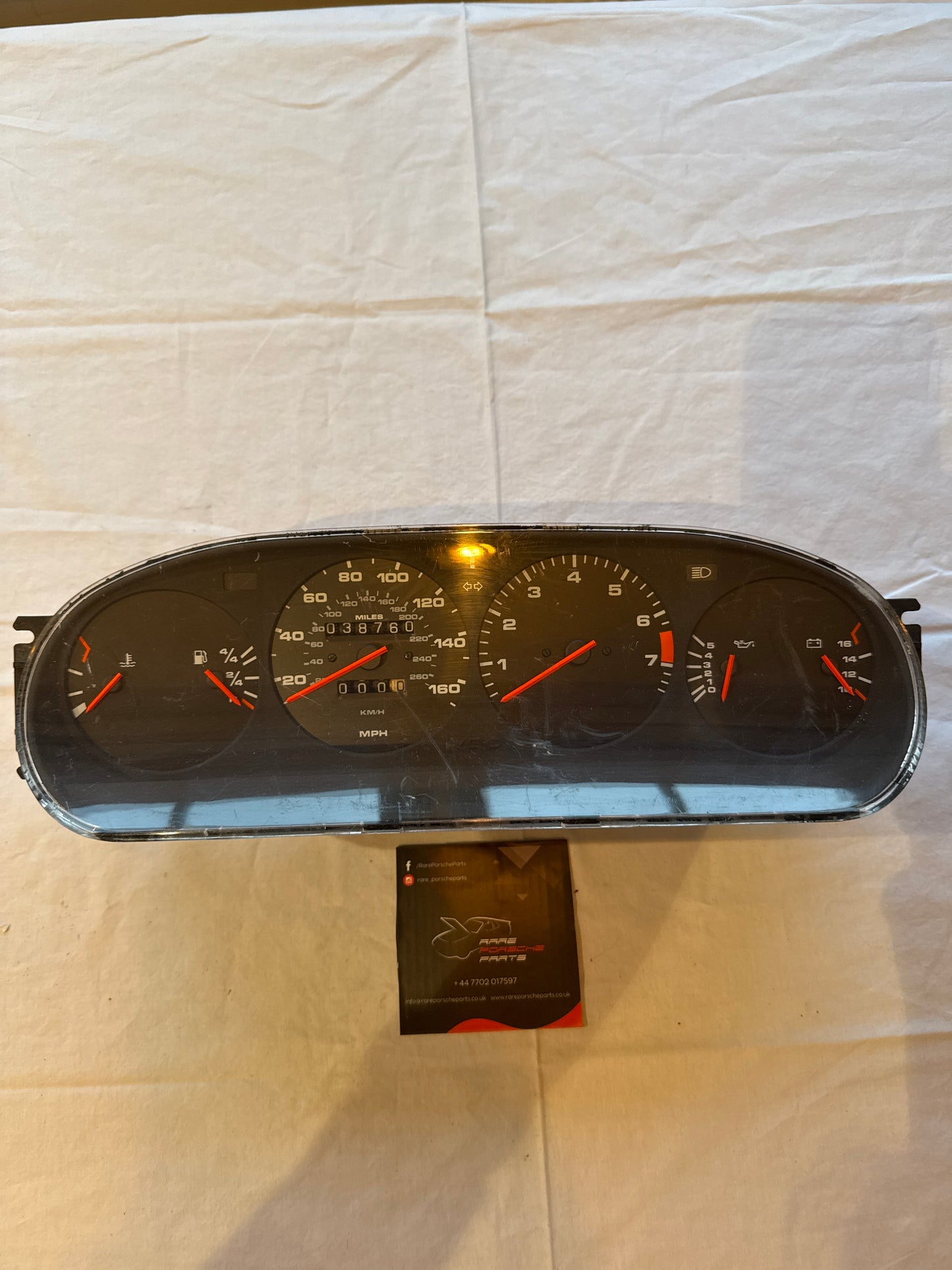 Porsche 944 dash clock binnacle pod speedometer, 94564131106 used 038760 miles plastic screen has some small scratches