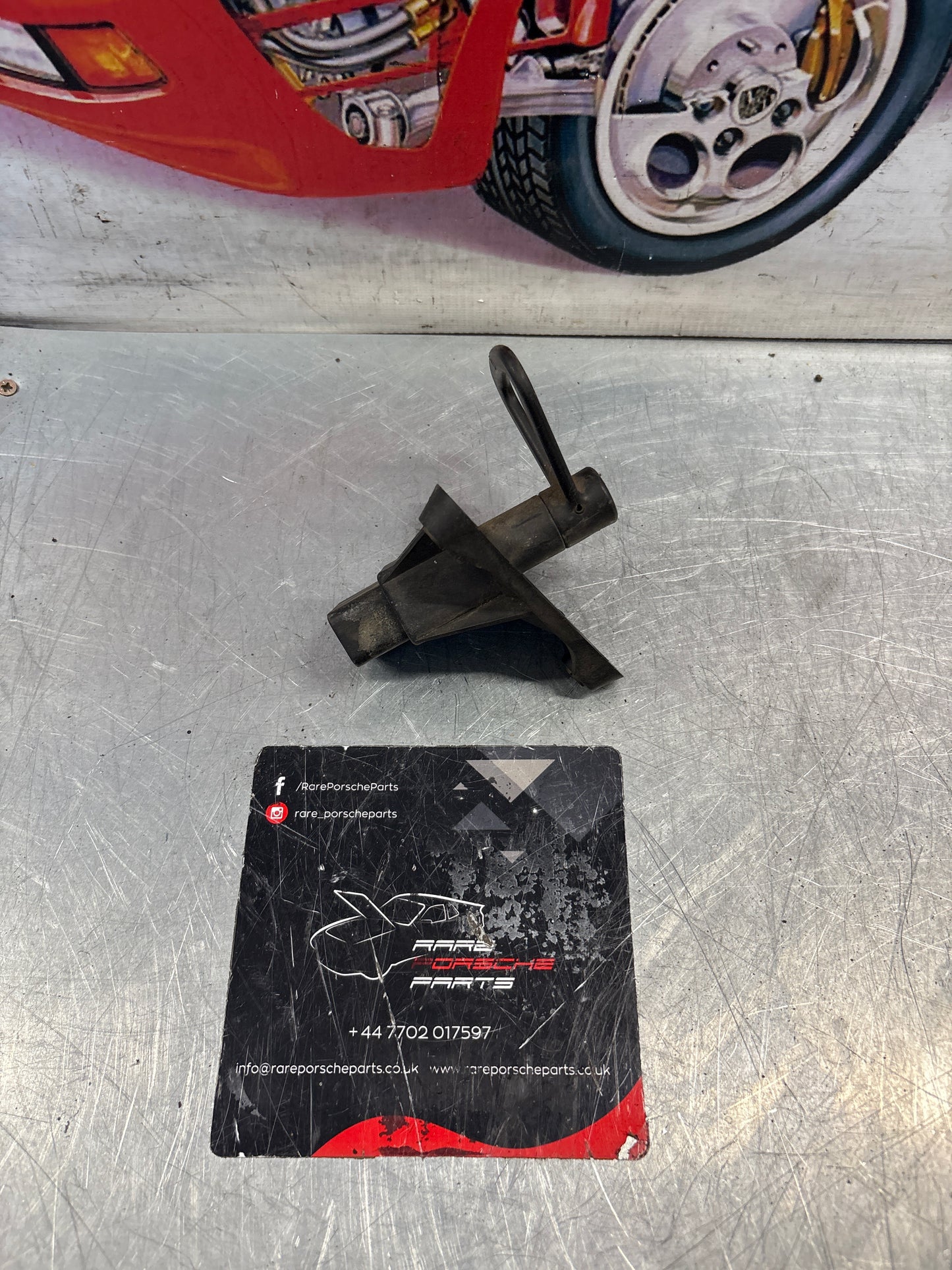 Porsche 968 headlight release frame, used 94475032100