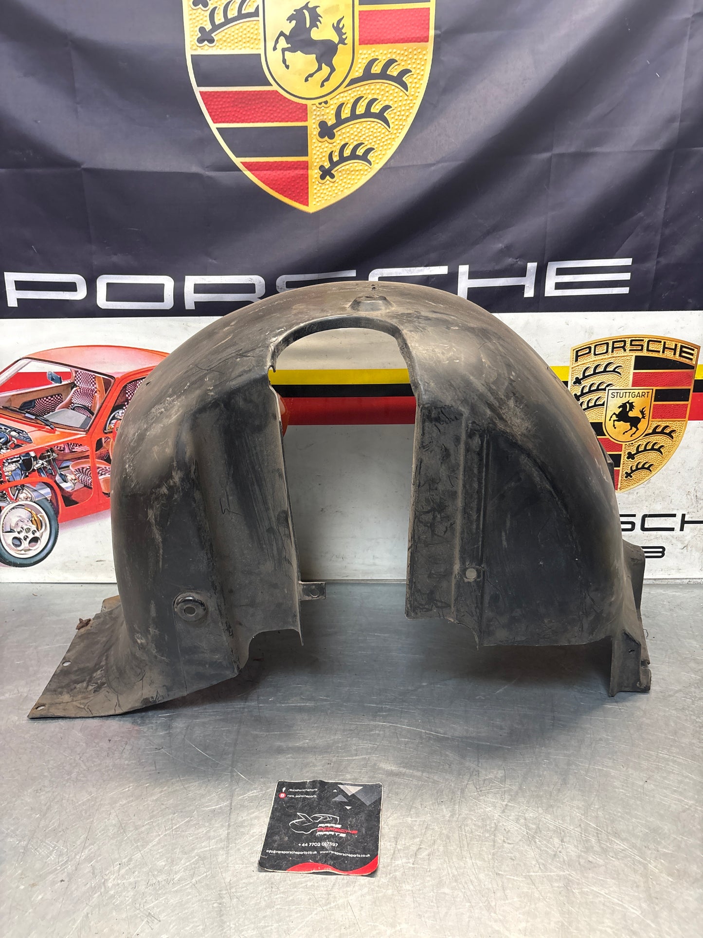 Porsche 944 from 85.5 wheel arch liner  Left, 94450438101 Used