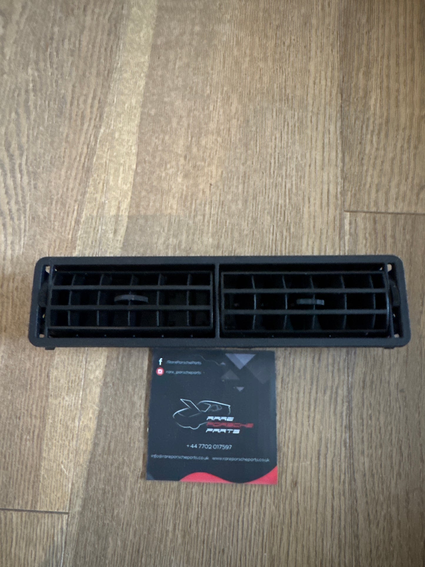 Porsche 924 944 Black Interior dash air vent. 477819173 New NOS