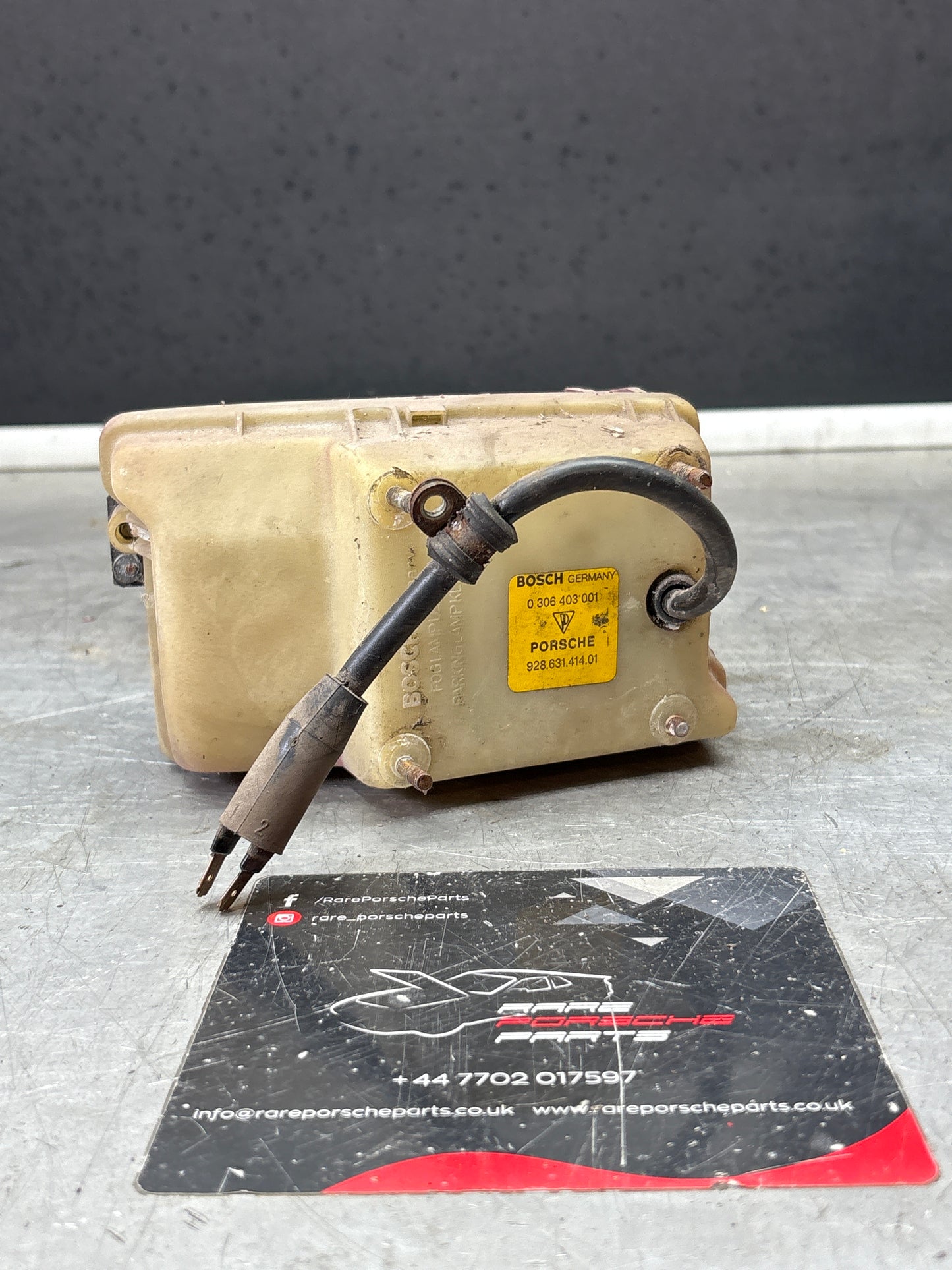 Porsche 928 Bosch headlight high beam, left 0306403001 / 92863141401